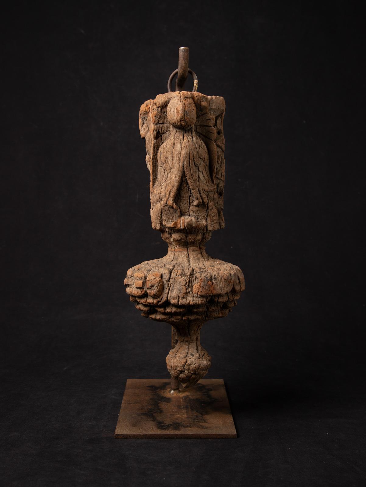 Discover the beauty of this antique Indian wooden temple fragment, a remarkable 16th-17th century artifact showcasing traditional craftsmanship. Carved from solid wood, this exquisite piece stands 49 cm high, 15 cm wide, and 25.5 cm deep, with a