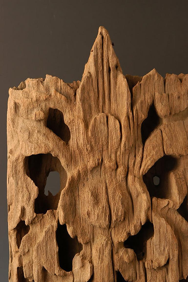Burmese wood carving panel with flower (found from the city 200 KM away from Pagan or Bagan).

Age: Burma, Ava Period, 16th Century
Size: Height 104 C.M. / Width 29.5 C.M. / Thickness 7 C.M.
Size including stand: Height 116 C.M.
Condition: nice