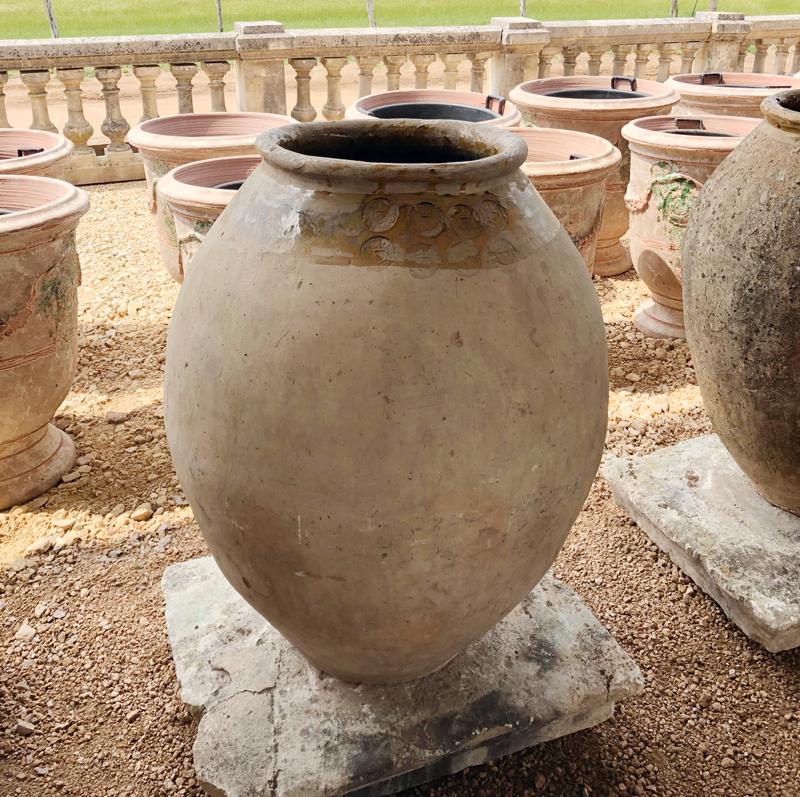 16th Century Jar from Fréjus with eight stamps

Classic French Antique Biot Olive Oil Jars date back to the 16th century. 
Biot potters worked from generation to generation, and from 1550 to the late 19th century 510 potters have been identified.