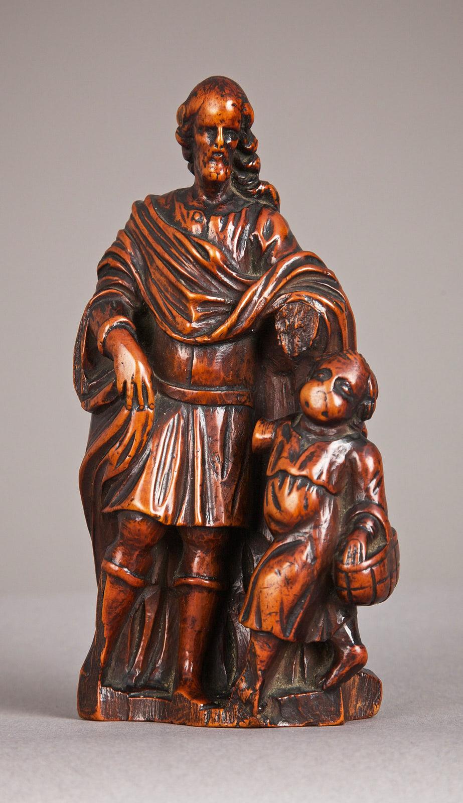Late 16th century boxwood carving of St Joseph, Flemish - Antwerp, circa 1580 - 1600.

The highly patinated figure of St Joseph with the Christ child carrying a basket.

Provenance: From the collection of Sam Wolsey, dealer in early English