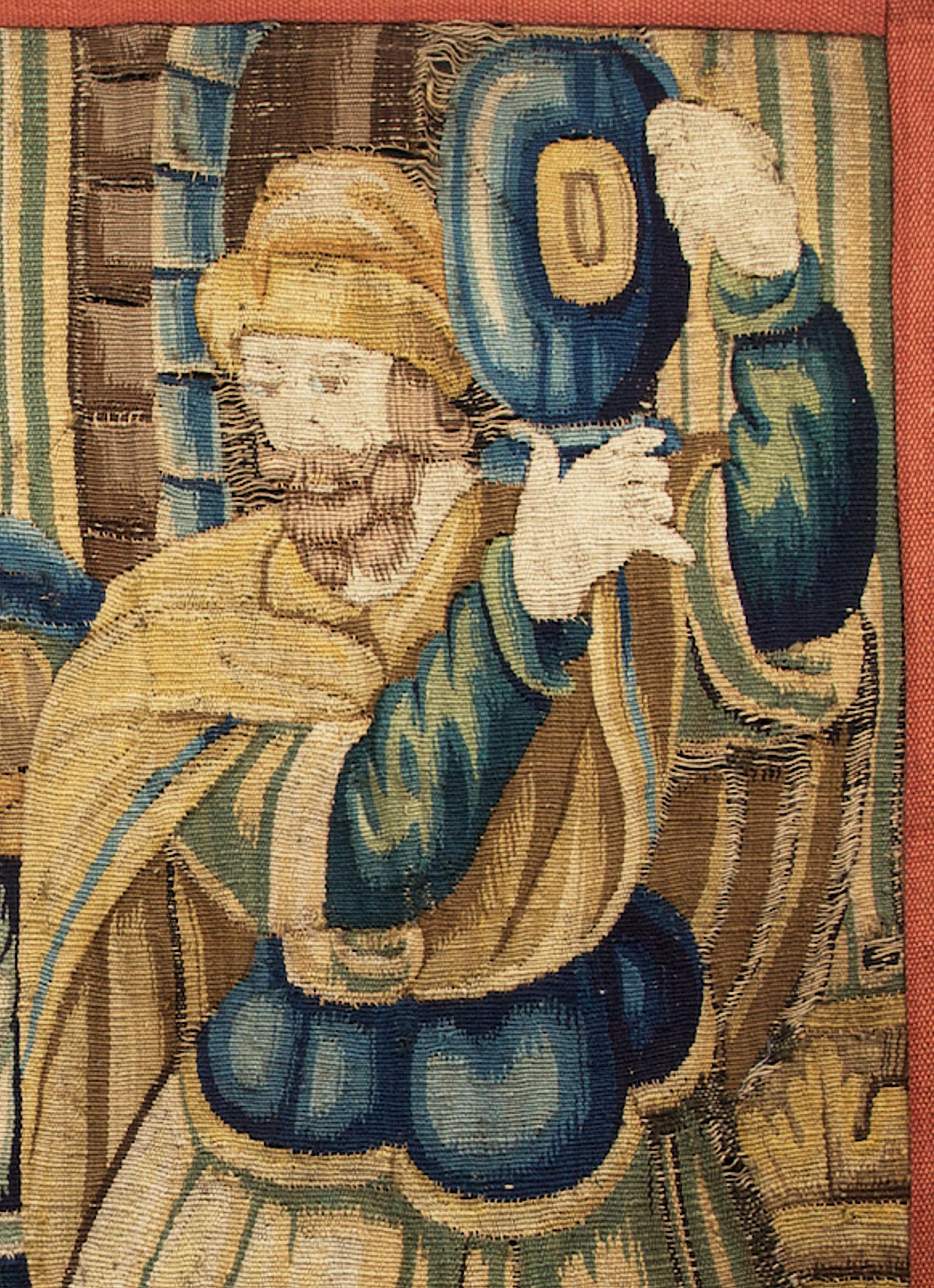Late 16th century Section of Tapestry, Brussels, circa 1600.

The Tapestry with three figures, carrying fruit, an urn and one crowned, possibly a scene of the adoration.

The scene removed from a larger original Tapestry.
  