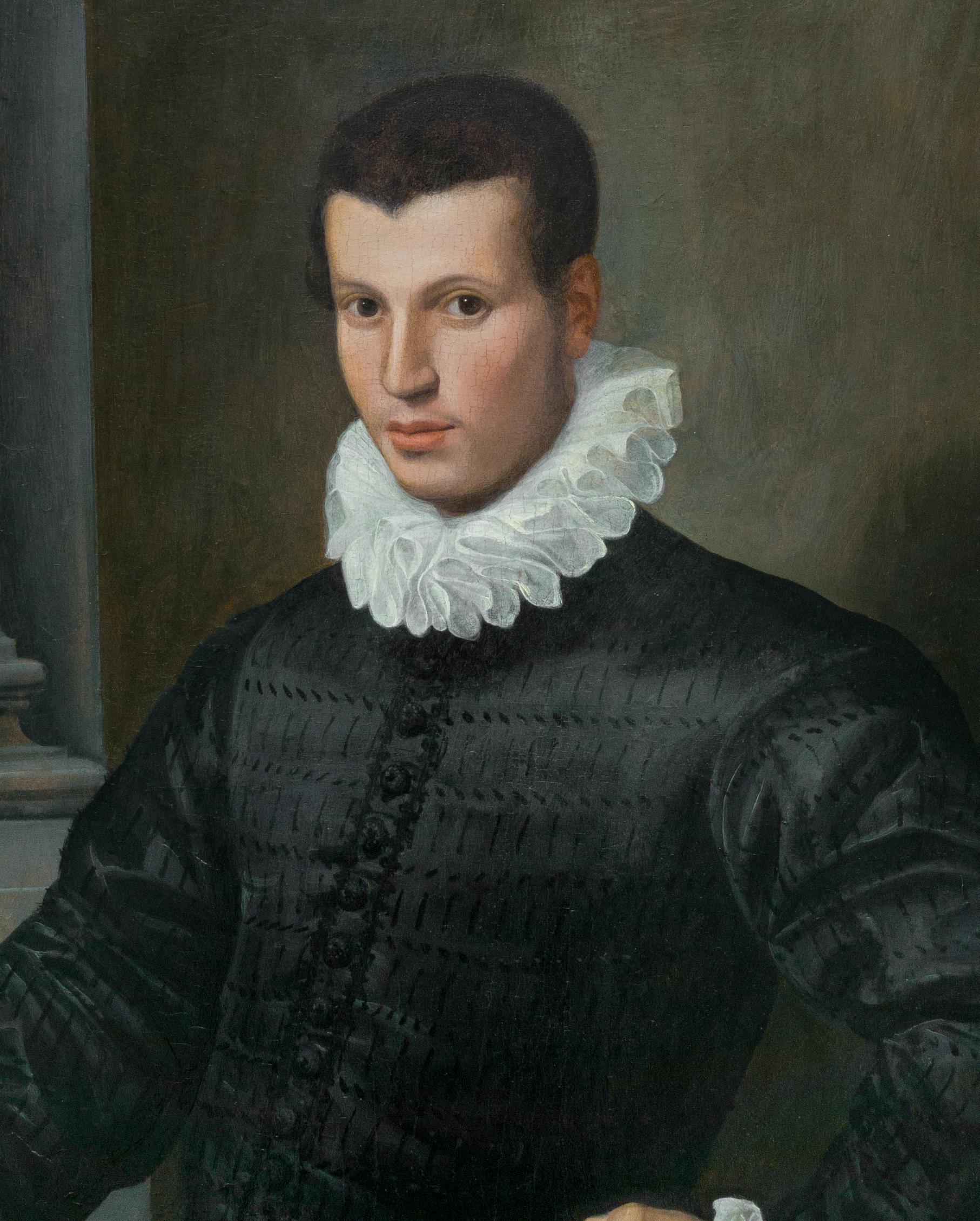 Portrait of a Gentleman in a Black Doublet Holding a Medallion c.1575/80
16th Century Florentine School

Titan Fine Art are pleased to present this magnificent oil on panel portrait.  Posing alongside a table dressed with red cloth, the young