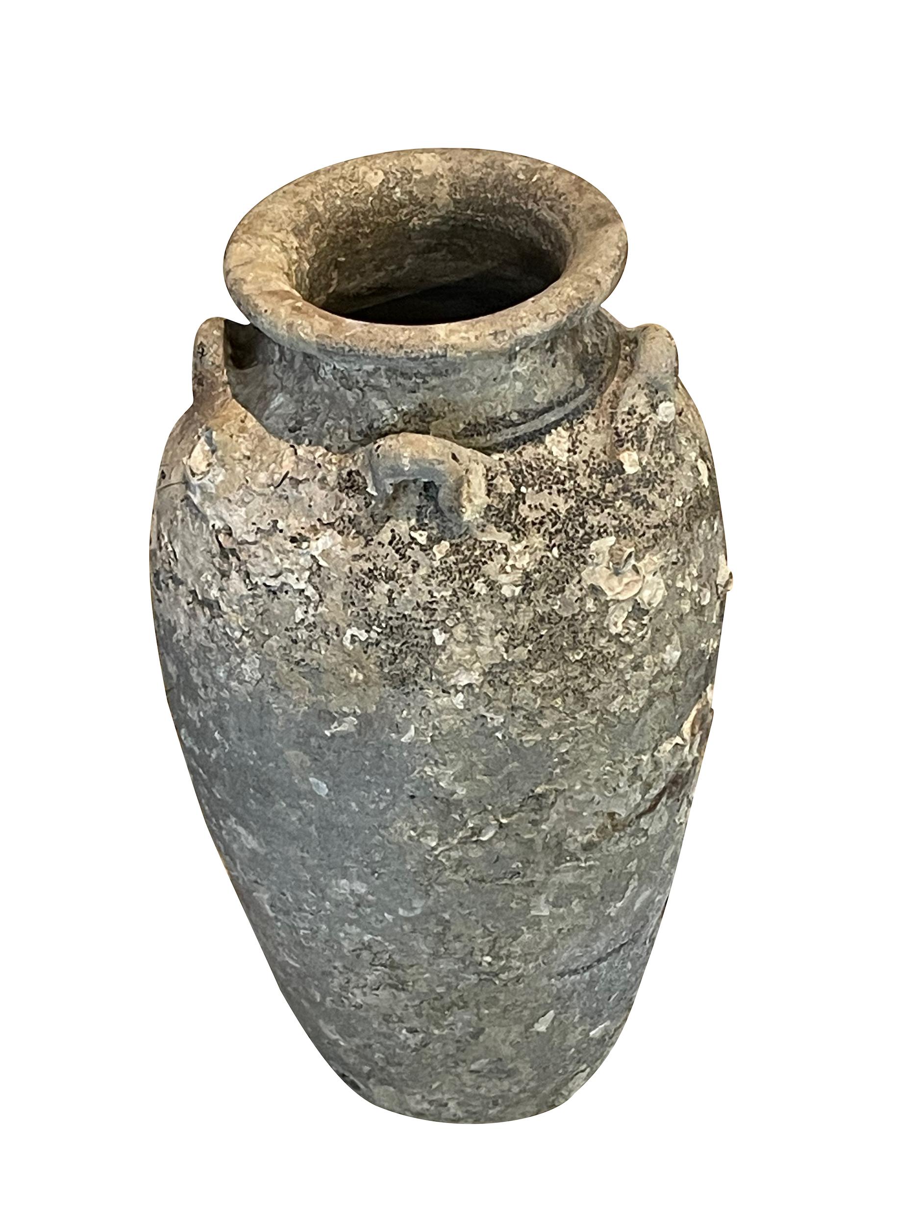 16th century Thailand Sawankhalok ceramic vase from the old city of Sawankhalok known for its pottery.
Beautiful and abundant fossil growth from being submerged under water.
Natural original patina.
Six Available
Part of a very large collection of