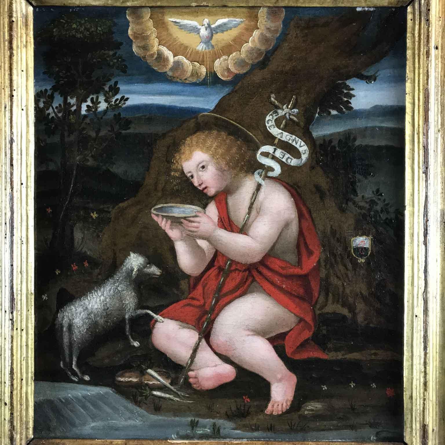 From Italy a late Renaissance 16th century religious painting depicting the Child Saint John The Baptist with a Lamb by an Italian artist of Lombard School, Mannerist period. Antique oil on canvas, an original first canvas painting of St. John the