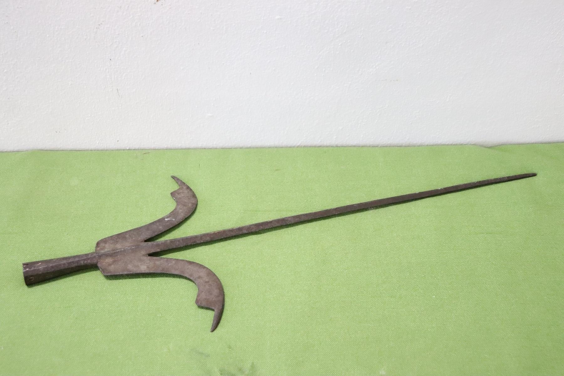 Important rare Renaissance Antique Iron Halberd Spear. For sale we offer only the tip, the wooden rod has been lost over the centuries. The expertly forged iron has the patina and the signs of use over all these centuries. This type of tip in the