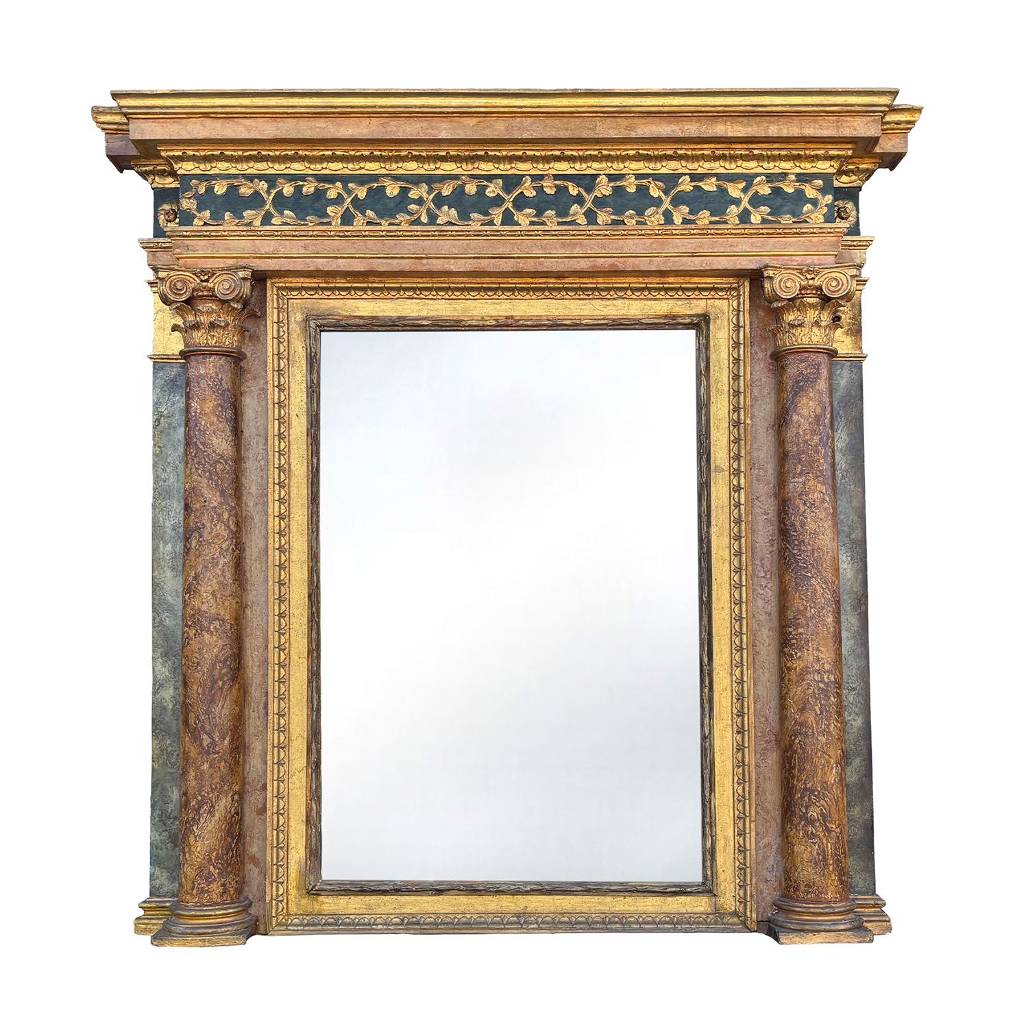 Specchio da parete italiano del tardo XVI secolo in legno di tiglio intagliato a mano, proveniente da una villa antica vicino a Verona, in buone condizioni. Le colonne ioniche in legno superbamente intagliate che le affiancano sono state rifinite