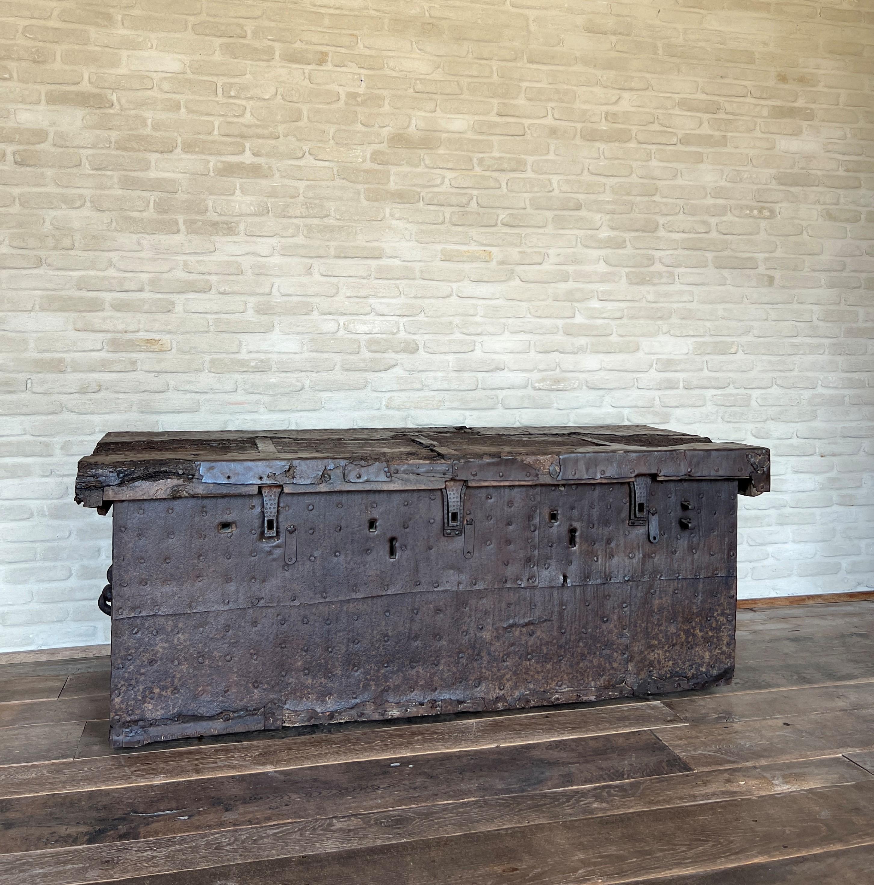 A quite large 16th century Italian so called 'coffre fort' . Coffers or chest like these were specifically made for cities or large villages to safegueard the gold and valuables. They are typically outfitted with 3 large locks of which the keys are