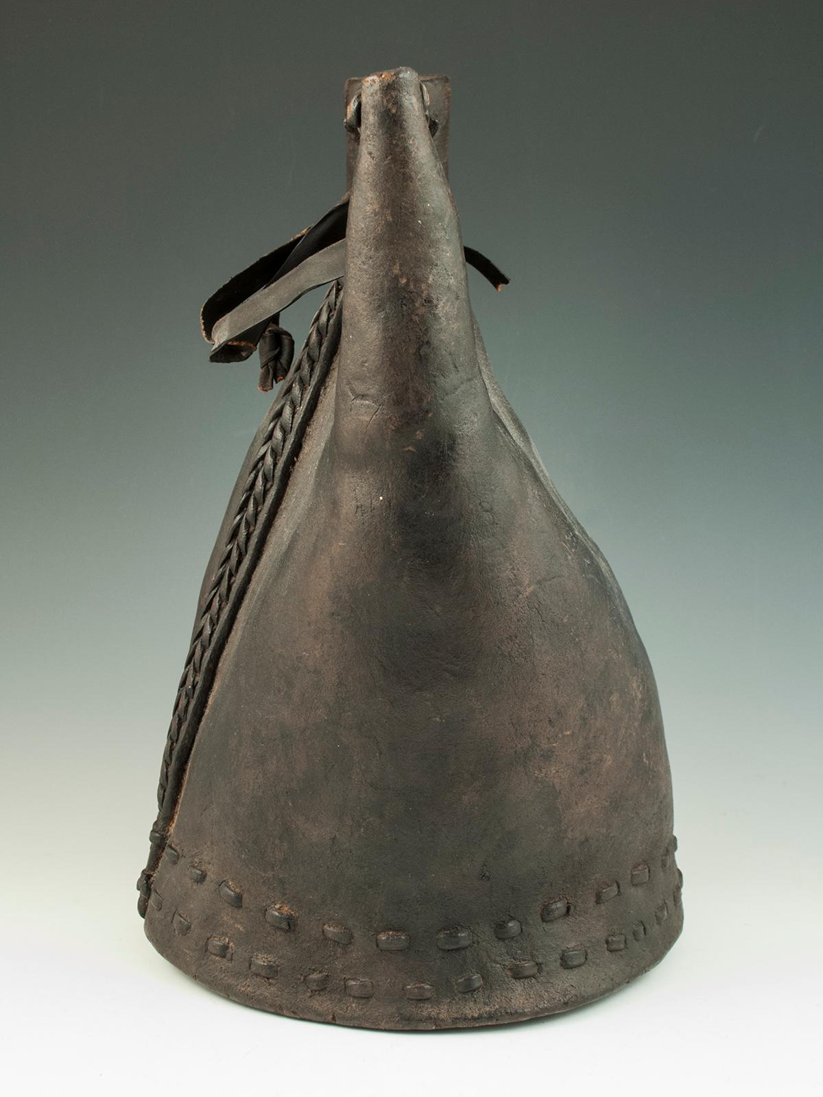 16th century leather tribal ottoman water flask (Matara), Turkey.

The round body of this matara tapers into two spouts: on the left is a small stitched opening for pouring and on the right is a larger opening for filling the flask. There would have