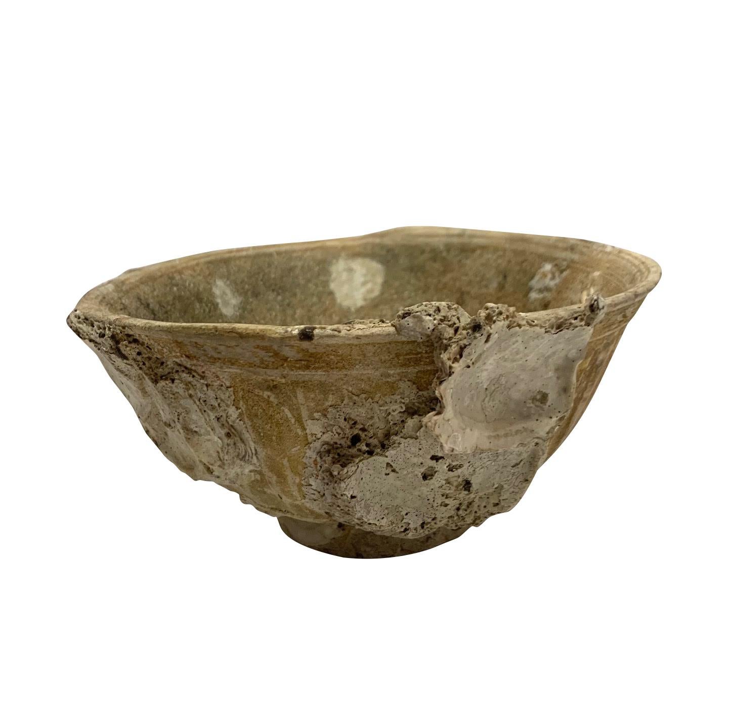 16th century Thailand ceramic bowl from Sawankhalok.
Discovered from a ship wreck.
Beautiful natural weathered patina.
Part of a large collection.
Sold individually.