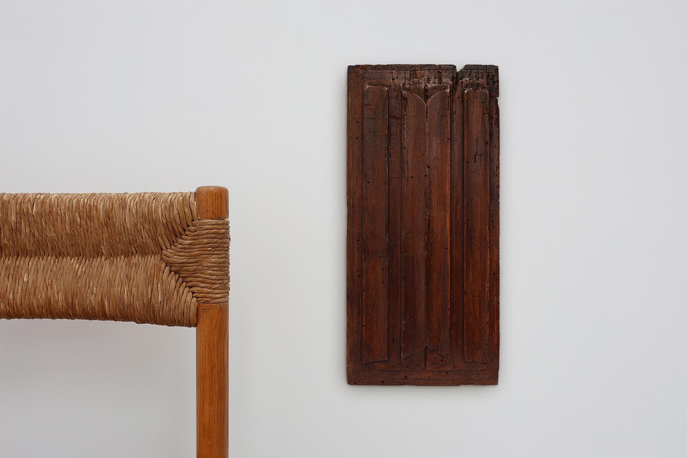 16th century / Belgium / Letter Panel / Oak / Gothic

A finely carved Gothic oak panel from 16th-century France. This architectural fragment features graceful vertical fluting framed by elegant, flowing arches at both the top and bottom—an