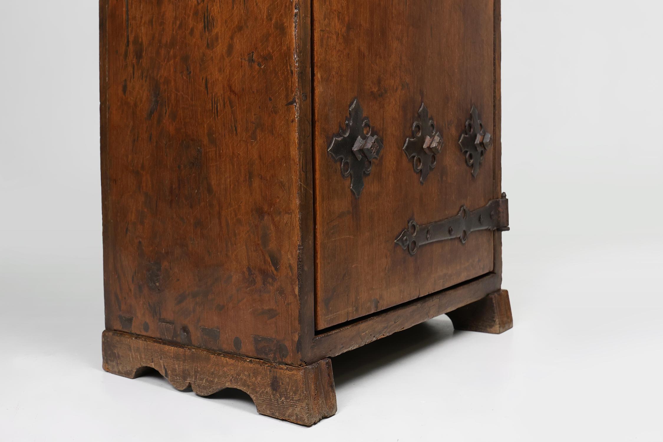 16th Century rustic cabinet in oak with ironwork, France 4