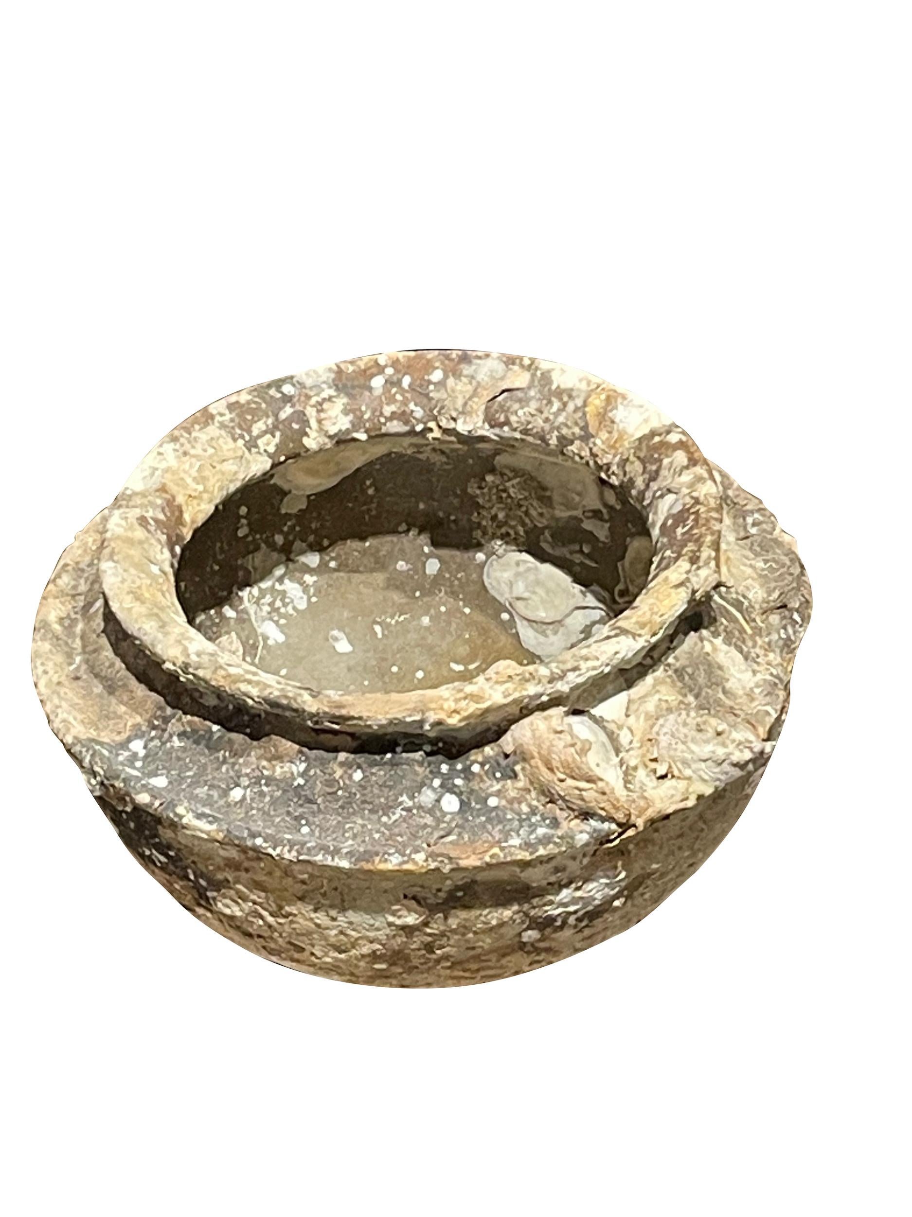 16th century Cambodian vessel found from shipwreck of the coast of Cambodia.
Beautiful natural shells and barnacles from being under water
for hundreds of years.
Museum quality.
