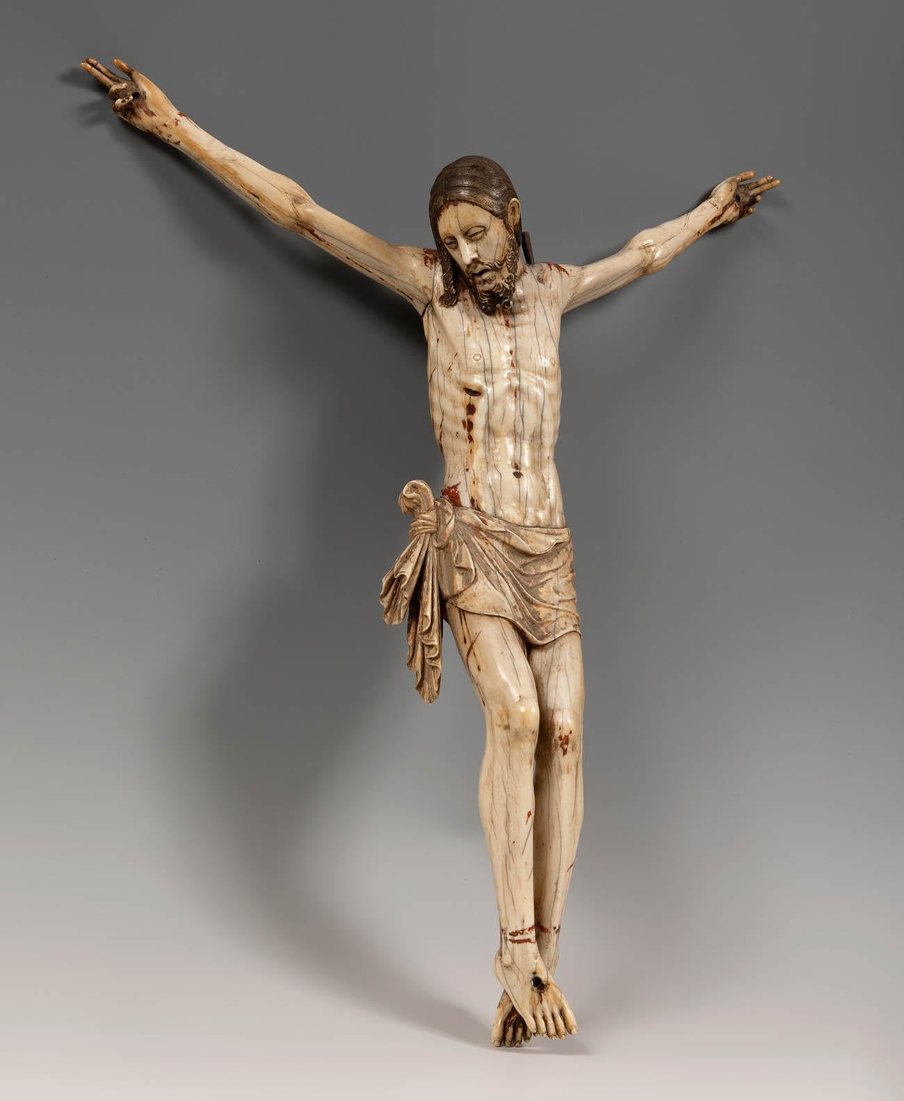 18th century Sinhalese-Portuguese ivory crucifix, an rare example of colonial art from Sri Lanka. 

It includes an antique certificate. The piece is inn excellent condition, no damages and original polychrome and period gilt. 

Dimension: 41 x