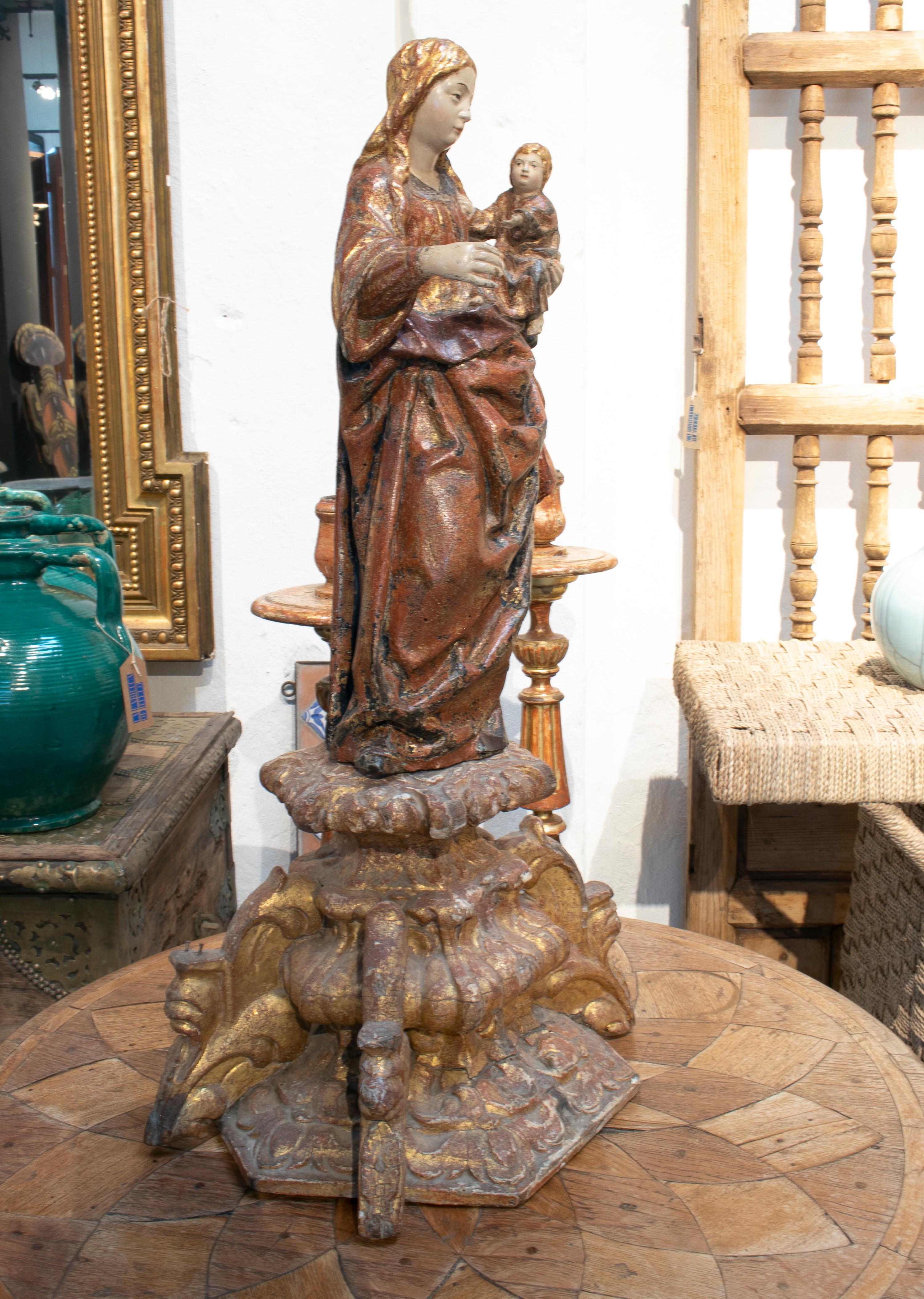 16th century Spanish hand carved wooden religious painted sculpture of woman with boy.