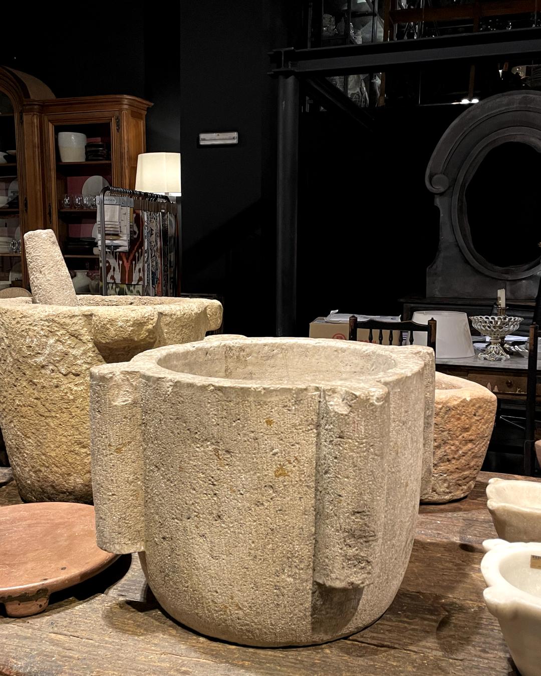 Embark on a gastronomic journey through time with our unparalleled culinary treasure, the Exquisite 16th Century Spanish White Stone Mortar. This monumental artifact, a symbol of the culinary sophistication of bygone eras, unveils its story within