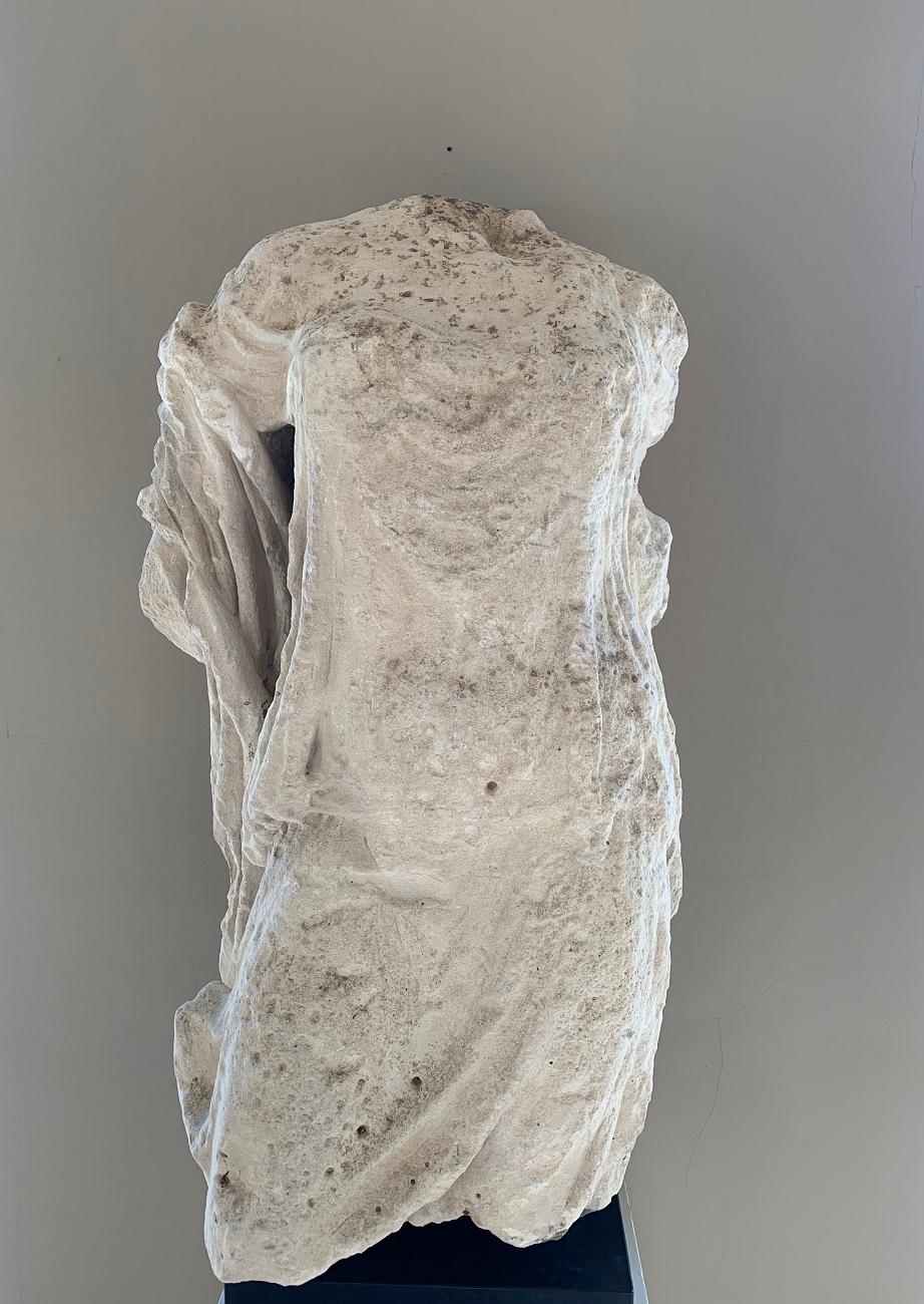 A wonderful 16th century draped female torso in classical style. Made in France under Italian Renaissance influence this female torso is finely sculpted with great detail to the stola and garments. The figure itself standing in contraposto to