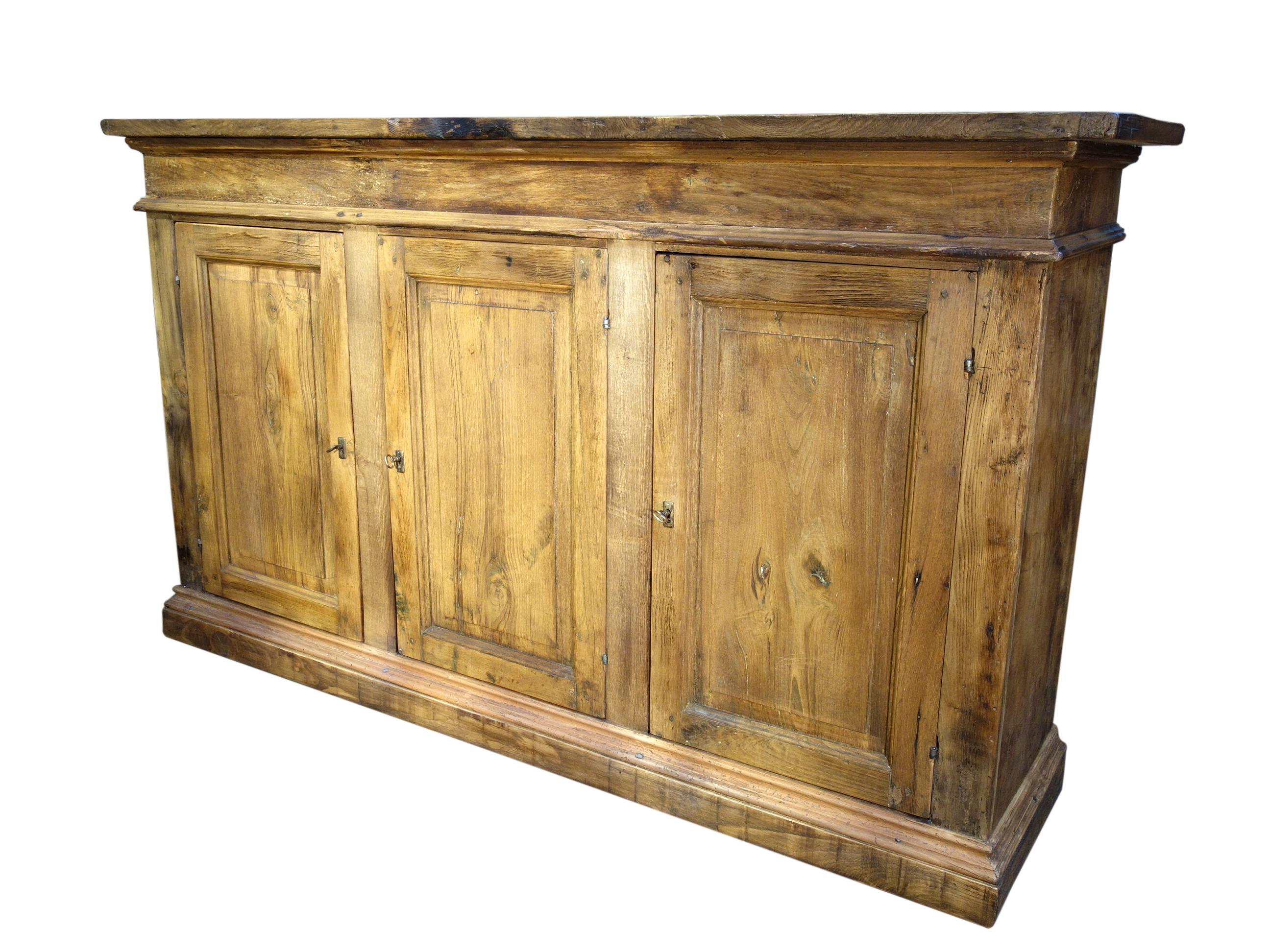 “Benevento” 3-door Mediterranean Old Chestnut Credenza, with 3 interior shelves:

Our stately & rustic style handcrafted credenza features Old Chestnut hardwoods, finely aged with distressed unstained patina and forged hardware. This “Benevento”