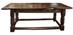16th Century Tudor Carved Oak Refectory Table with Plank Top and Carved Base