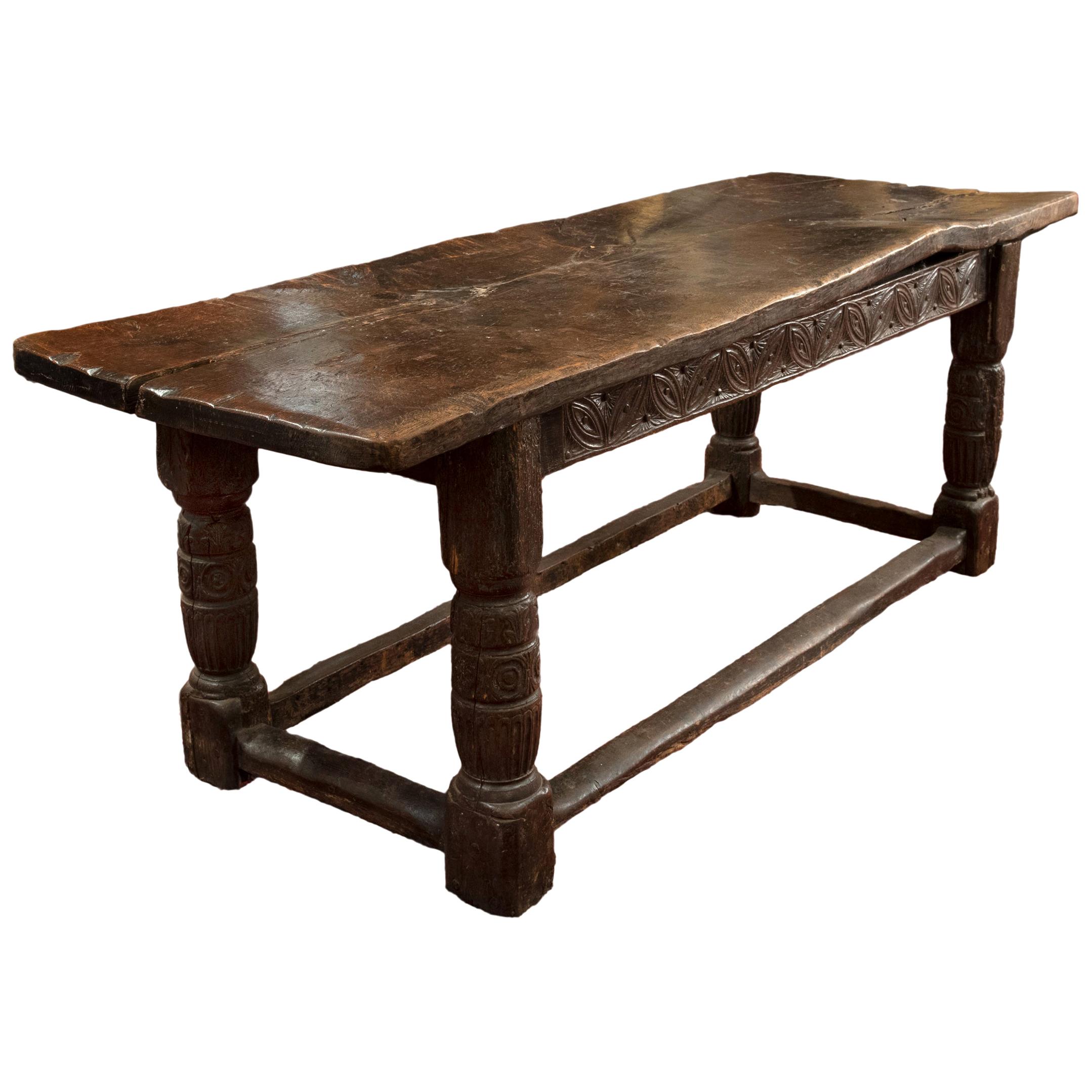 16th Century Tudor Carved Oak Refectory Table with Plank Top and Carved Base