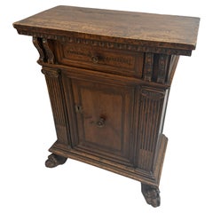 16th Century Tuscan Late Renaissance Carved Walnut Credenza with Lion's Paw Feet