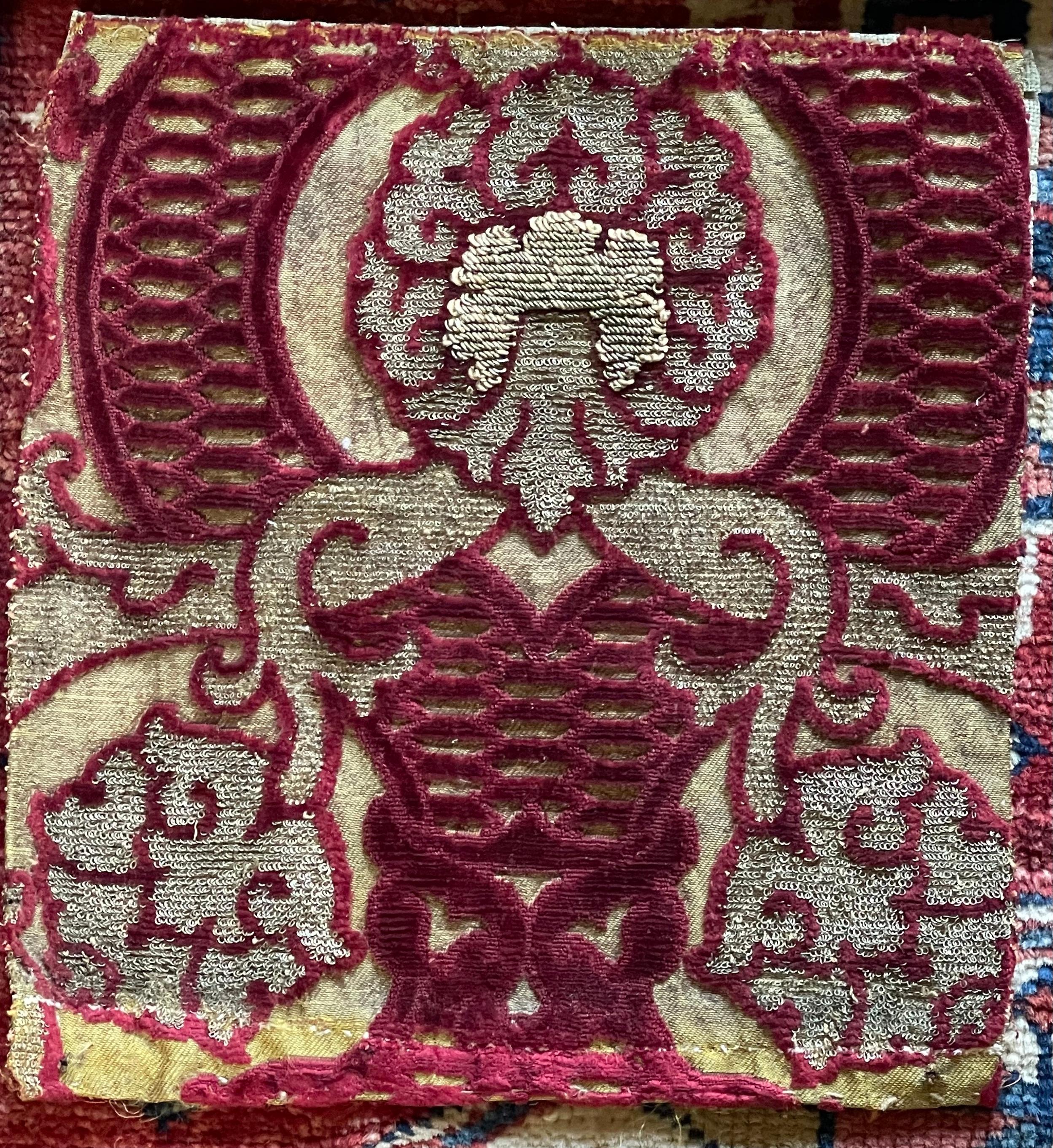 A panel of Cisele Velvet
Venetian and dating from second half of 16th century

An Ottoman Pomegranate design. The deep pile Magenta silk velvet voided to reveal a gold metallic ground. Further embellished with Silver metal thread Boucle