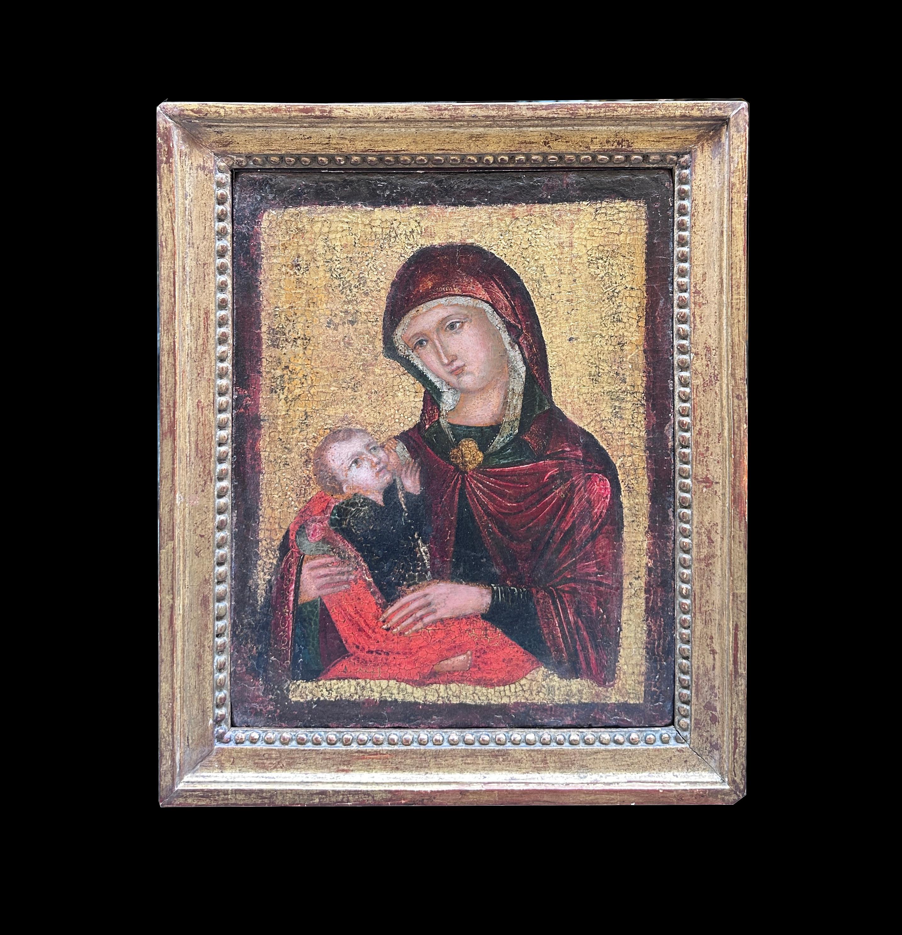 This beautiful work of art concerns a Virgin Mary with Child painted on a walnut tablet with a Venetian golden background, dating back to the 16th century. The technique used is oil painting on a golden chalky background, which gives depth and