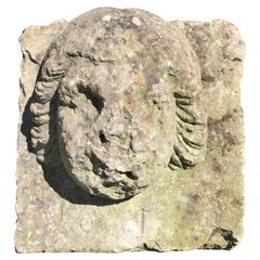 16th Century Weathered French Hand Carved Limestone Cherub Head