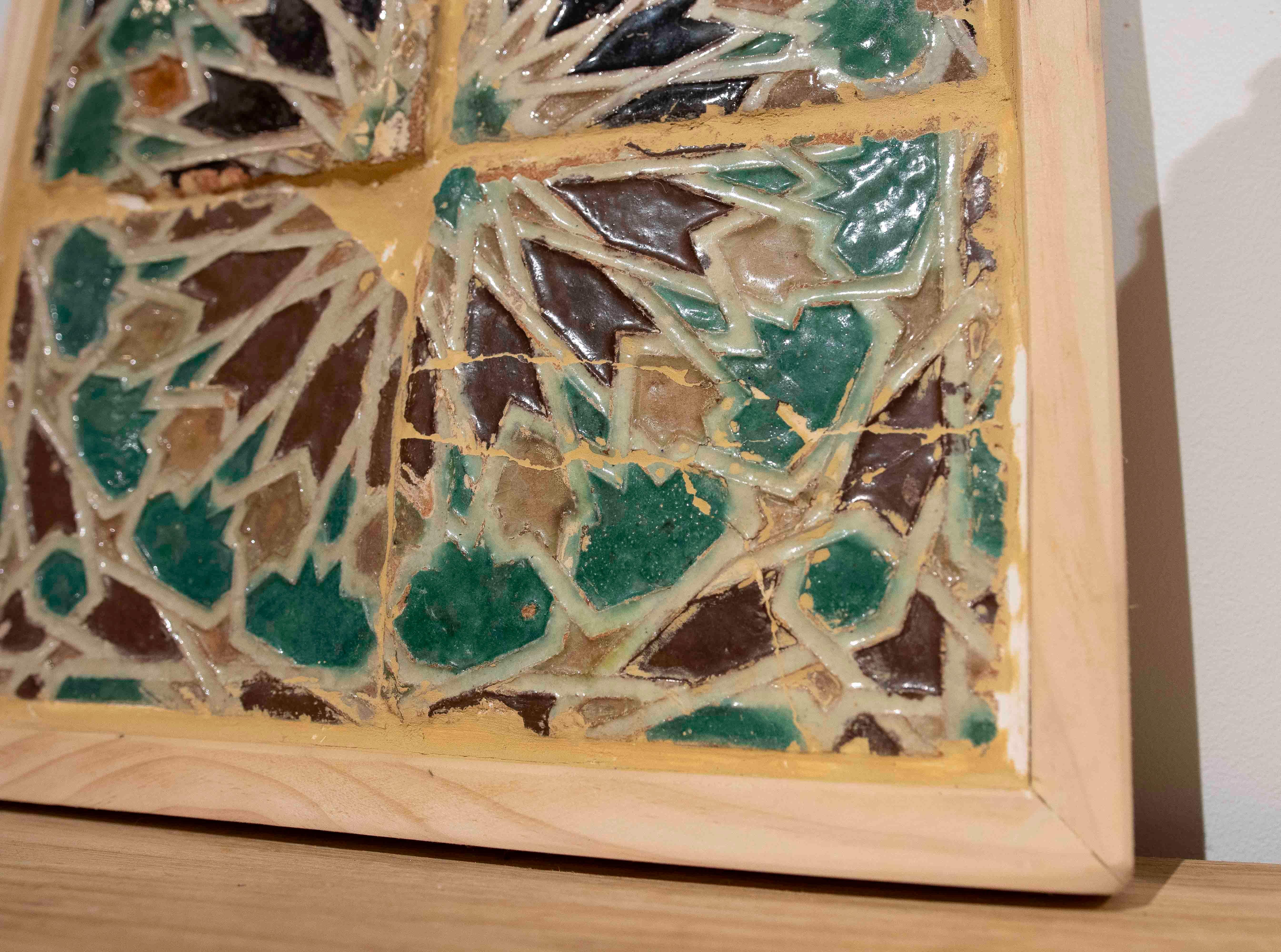 Ceramica 16th Panel of Four Antique Geometric Glazed Tiles in a Wooden Frame in vendita
