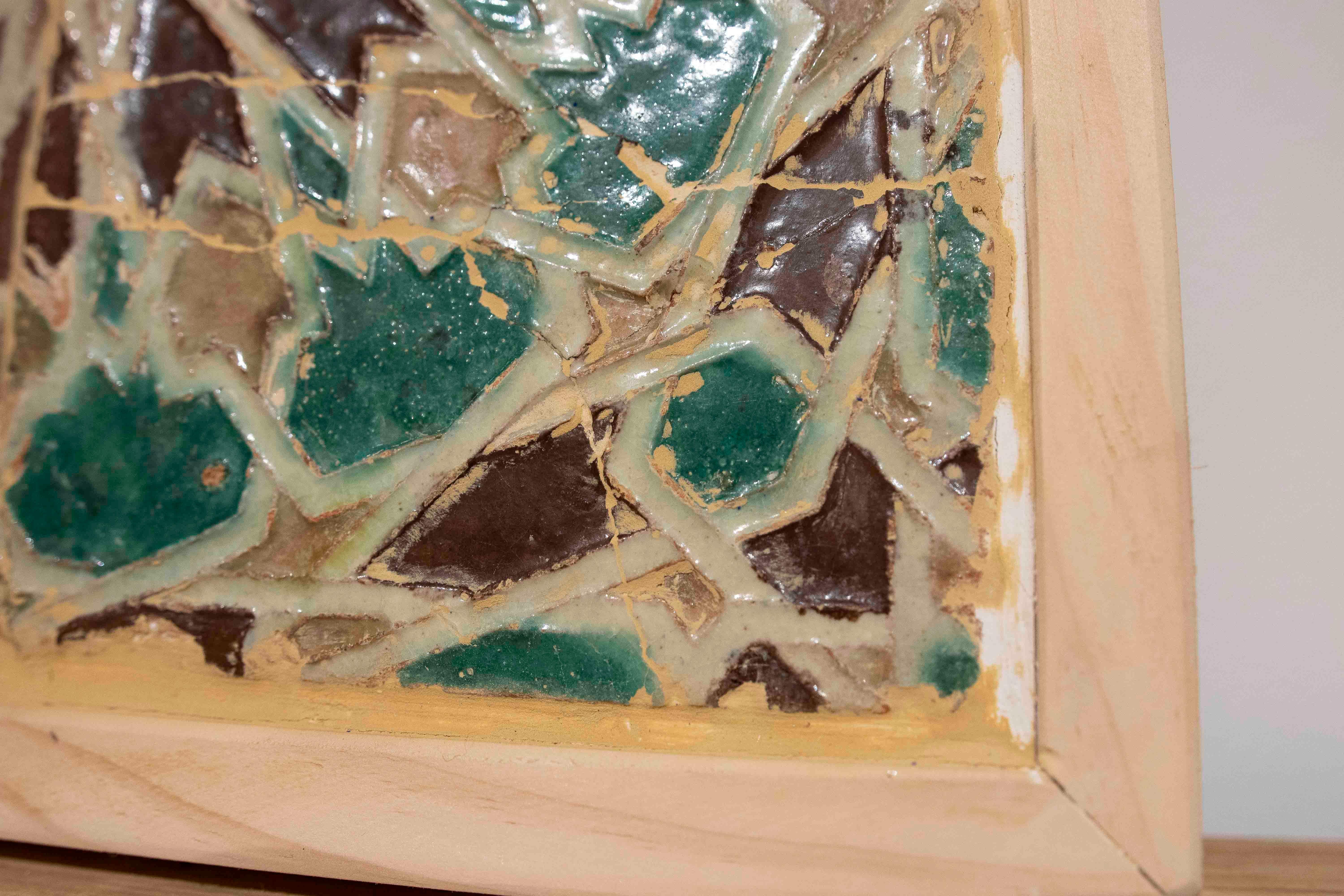 16th Panel of Four Antique Geometric Glazed Tiles in a Wooden Frame in vendita 1