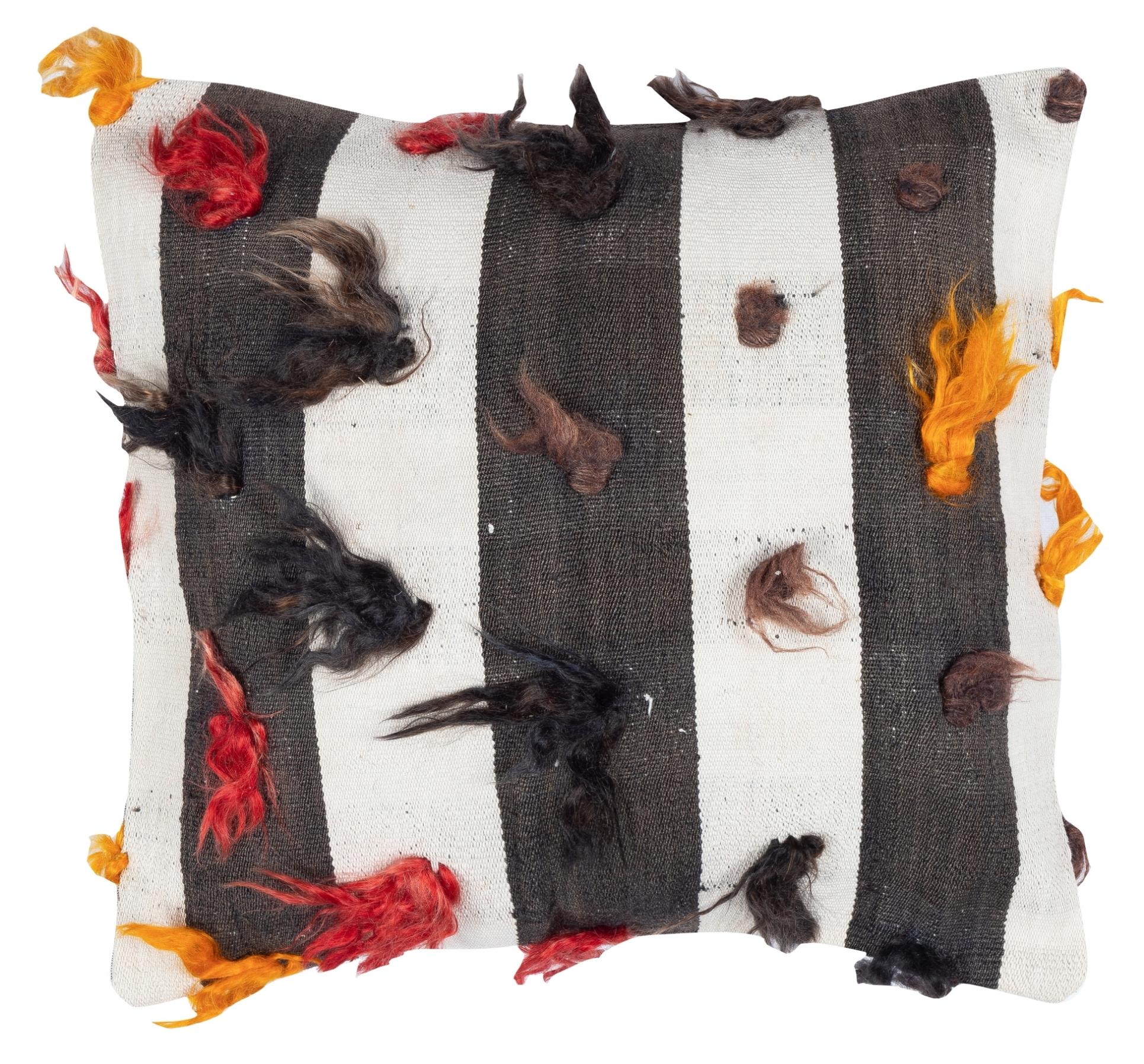 Bring history and warmth into your home with this vintage handmade Turkish wool cushion cover set. This pair of cushion covers is carefully crafted from authentic hand-knotted Turkish kilims. Each cover is truly one-of-a-kind, featuring intricate