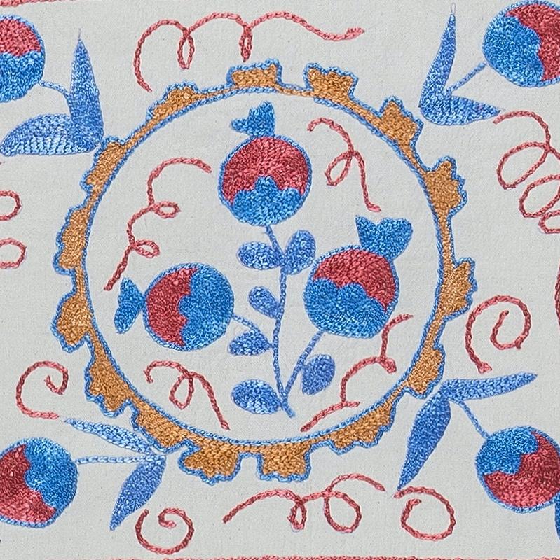 Decorative cushion cover made of hand embroidery silk on linen background, flowers and vine motifs, linen backing with zipper, no insert.
Delicate and specialised washing advised.

Suzani, a Central Asian term for a specific type of needlework, is