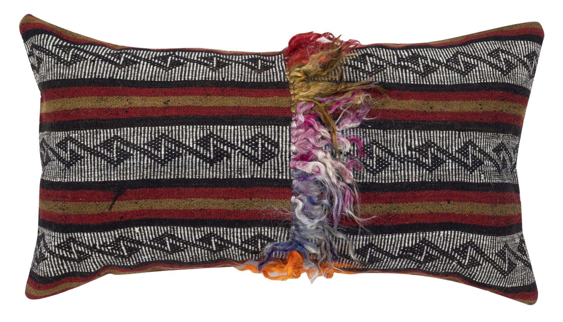 Bring history and warmth into your home with this vintage handmade Turkish wool cushion cover set. This pair of cushion covers is carefully crafted from authentic hand-knotted Turkish kilims. Each cover is truly one-of-a-kind, featuring intricate