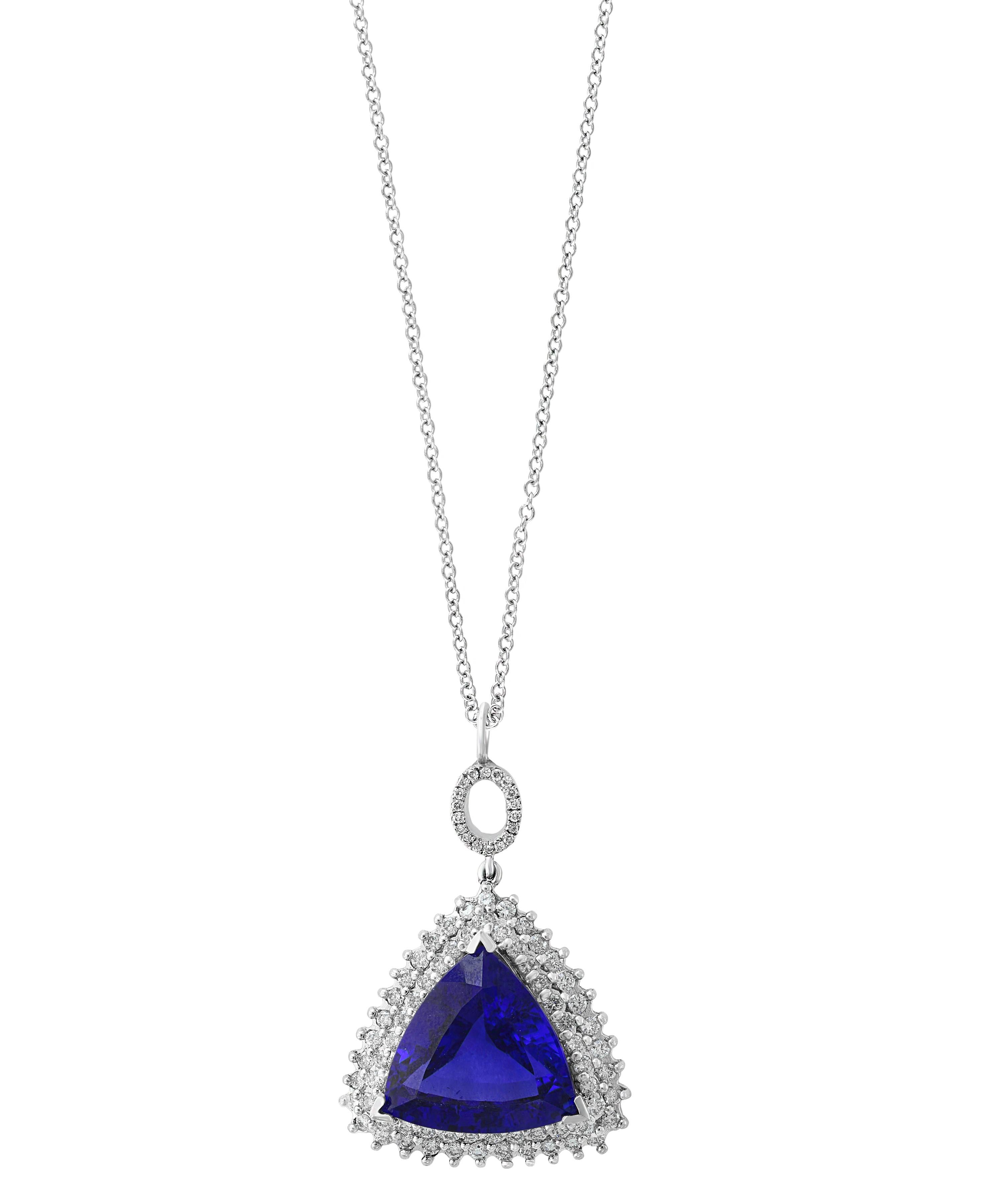 
17 carats of fine  quality of  Tanzanite pendant surrounded by brilliant round  cut Diamonds all mounted in 18 karat White  gold. Weight of the necklace is 13 Grams . 
Tanzanite Weight  17 Carats
Diamond Weight 3.6 Carats
18 K gold Weight  13