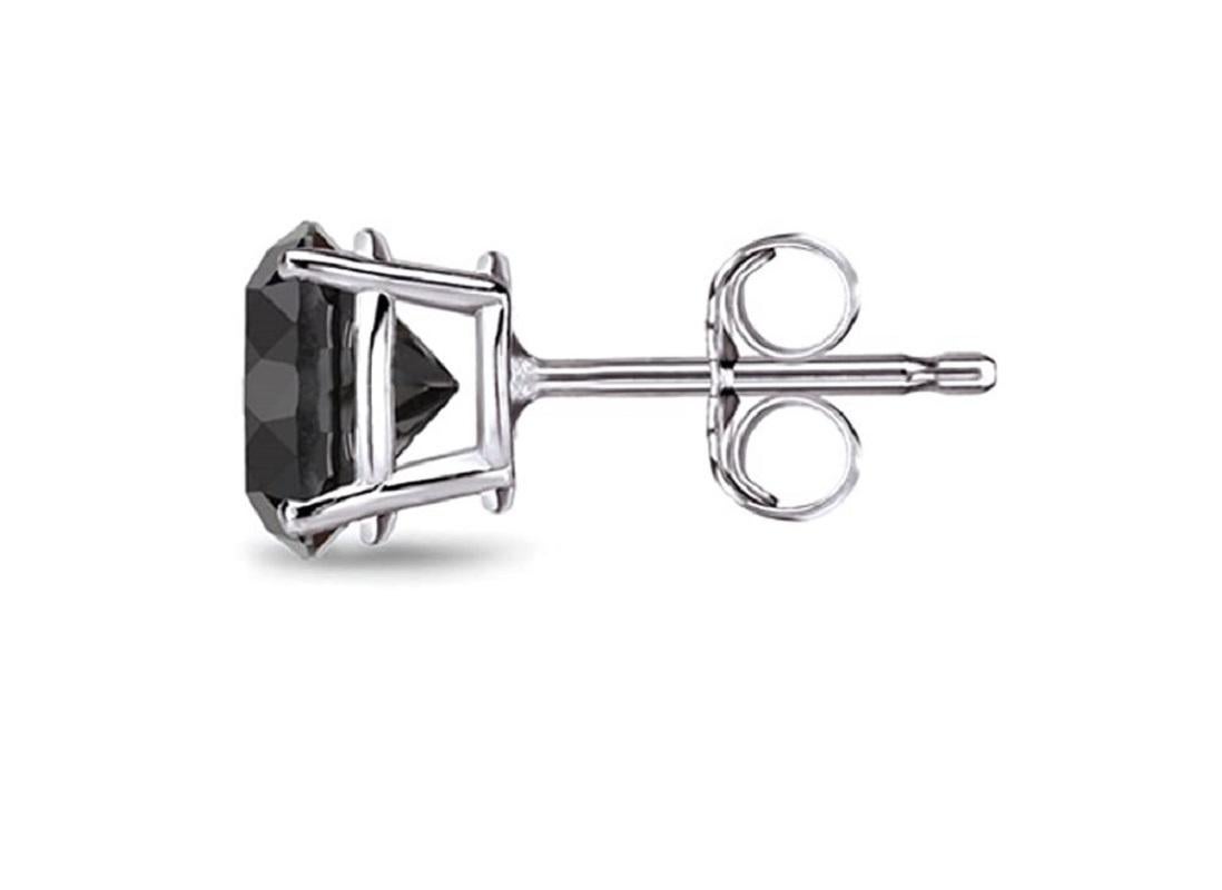 Alluring and refined, these diamond stud earrings are sure to be noticed. Created in 14 K White gold, the earring showcases a beguiling 1.7 carat natural black diamond solitaire measuring 6.70 x 6.71 x 5.08. Exquisitely made and Captivating with a