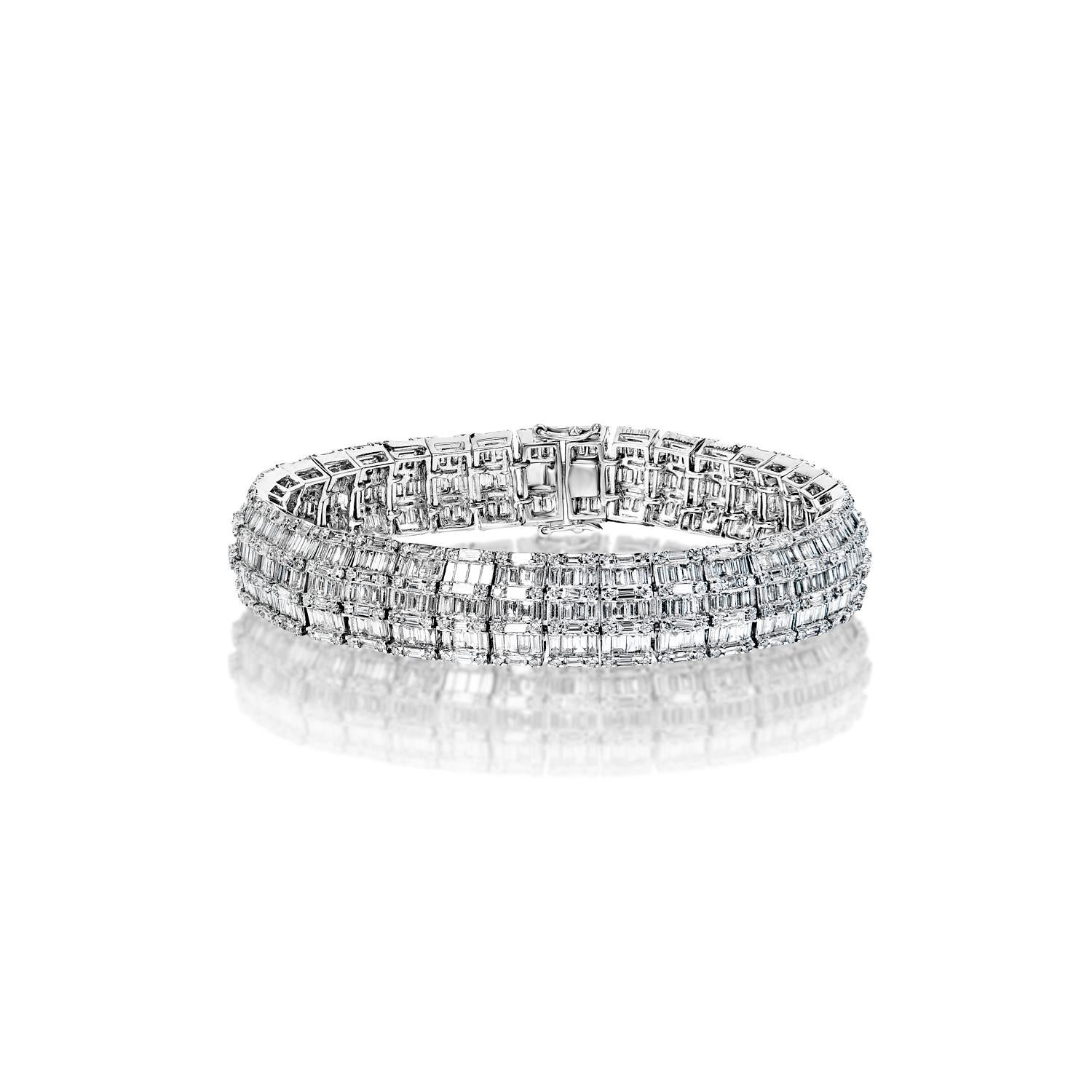 The ELODIE 17 Carat Diamond Tennis Bracelet features COMBINE MIX SHAPE DIAMONDS brilliants weighing a total of approximately 17.38 carats, set in 14K White Gold.

Style:
Diamonds 
Diamond Size: 17.38 carats
Diamond Shape: Combine Mix Shape
Metal: 14