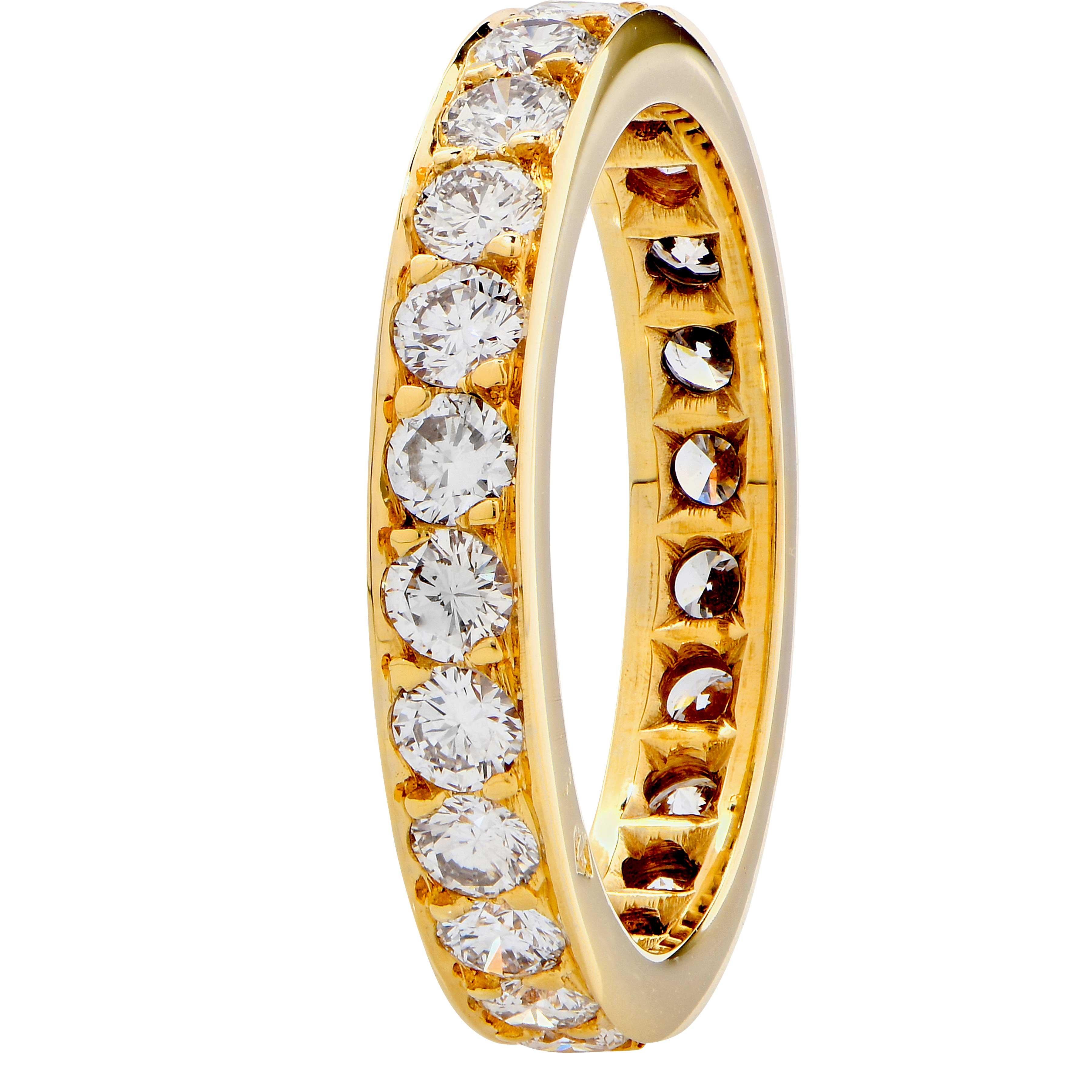 18 Karat Yellow Gold Eternity Band features 24 Round Brilliant Cut Diamonds I Color VS Clarity with an estimated total weight of 1.7 carats.
French Hallmarks
Ring Size: 6
Metal Weight: 3.9 Grams