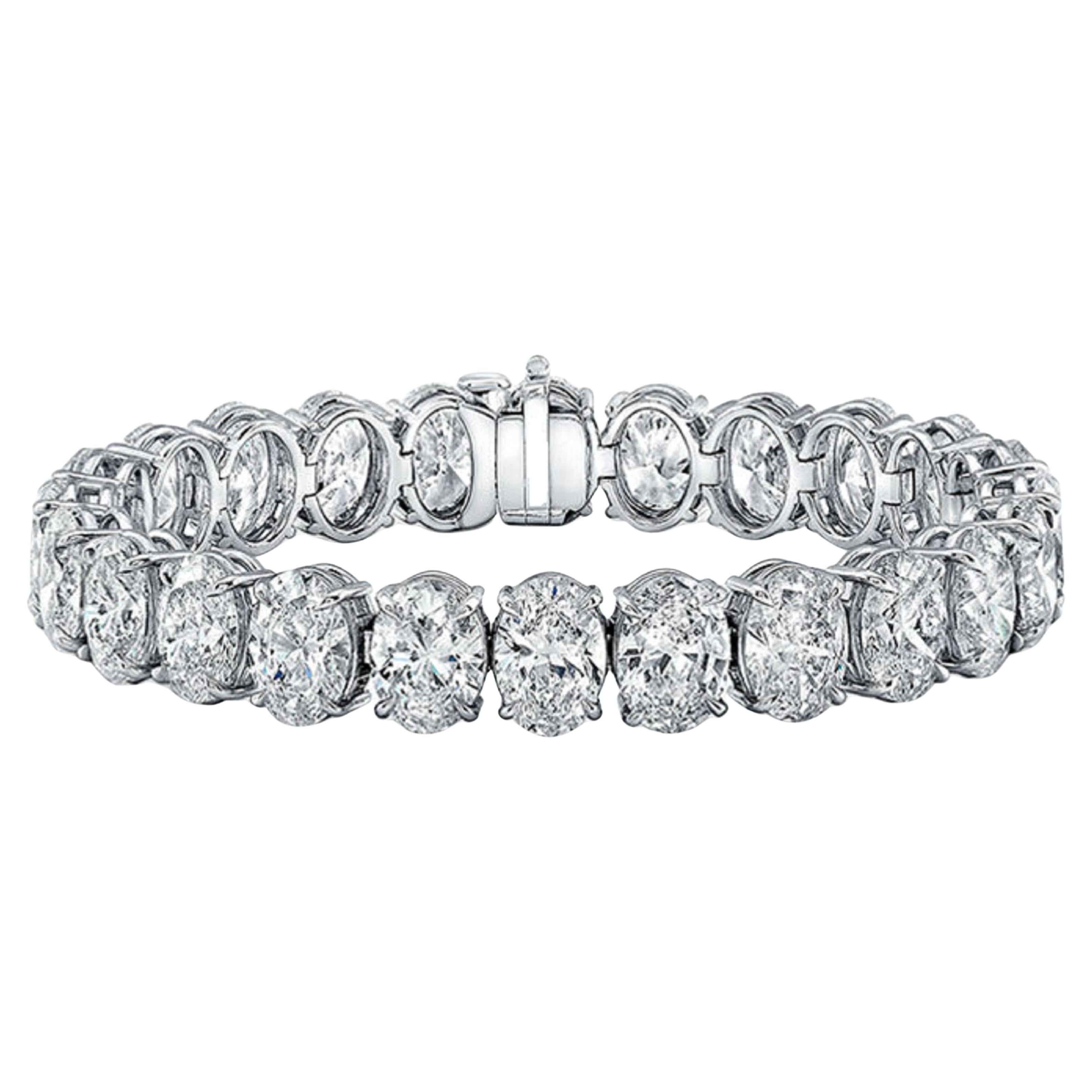 This exquisite bracelet made by Antinori di Sanpietro ROMA features oval cut diamonds weighing an astounding 19 carats total. All stones are very white and perfectly matched.  A very elegant and timeless piece.  
Color of the diamonds is D-F clarity