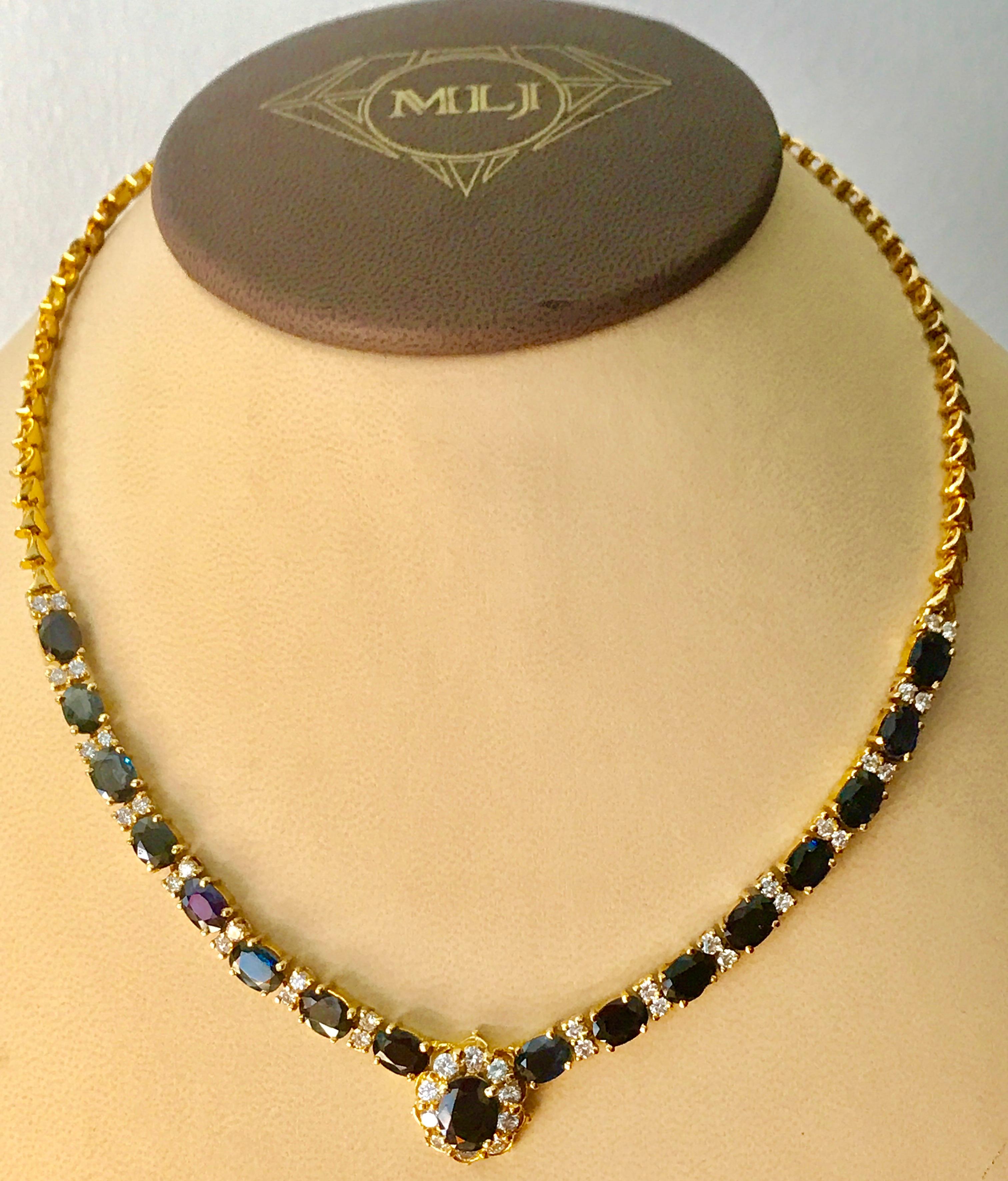 Women's 17 Carat Oval Sapphire and 3.5 Carat Diamonds Necklace 18 Karat Yellow Gold For Sale