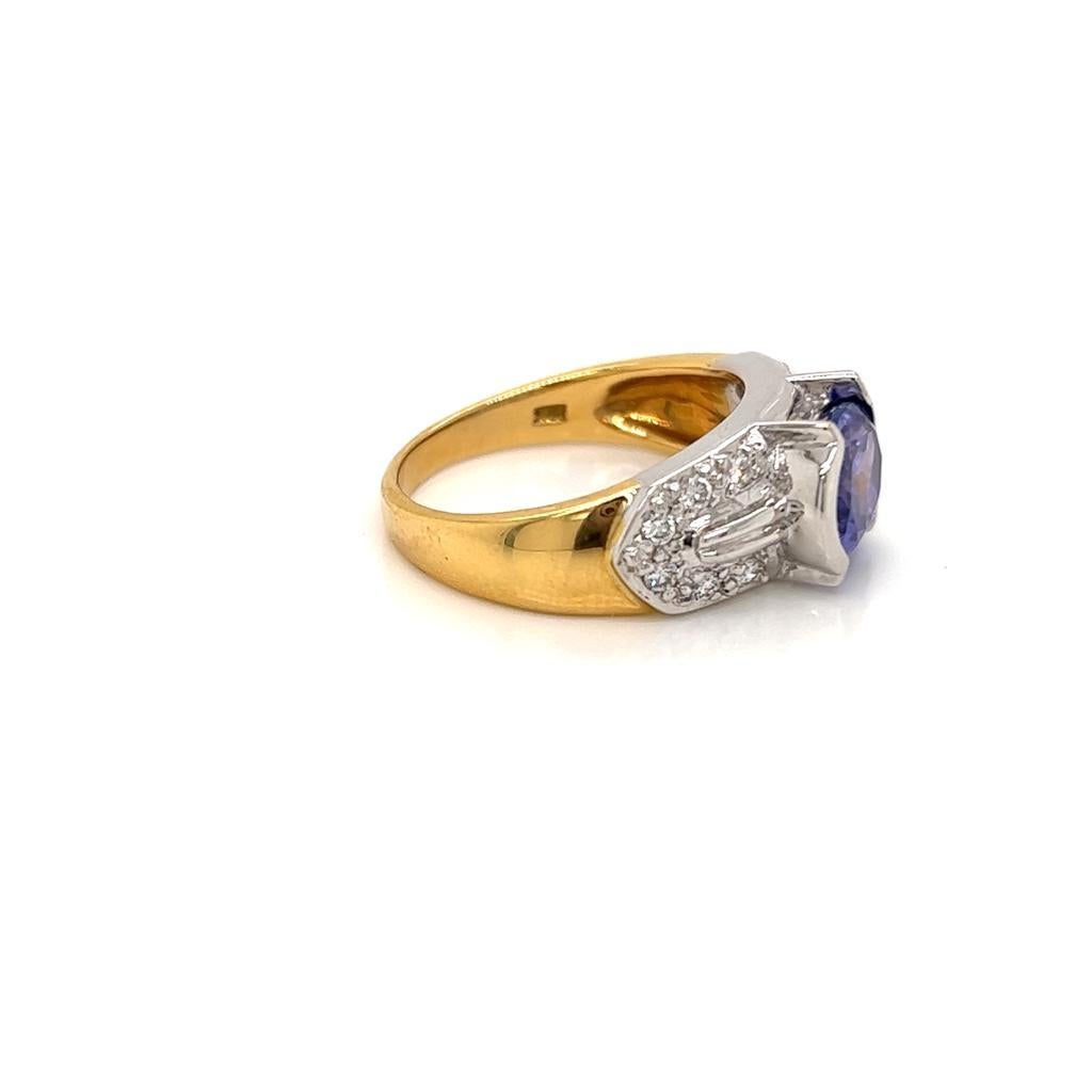 Oval Cut 1.7 Carat Oval Tanzanite and Diamond Ring in 18 Karat Yellow and White Gold For Sale