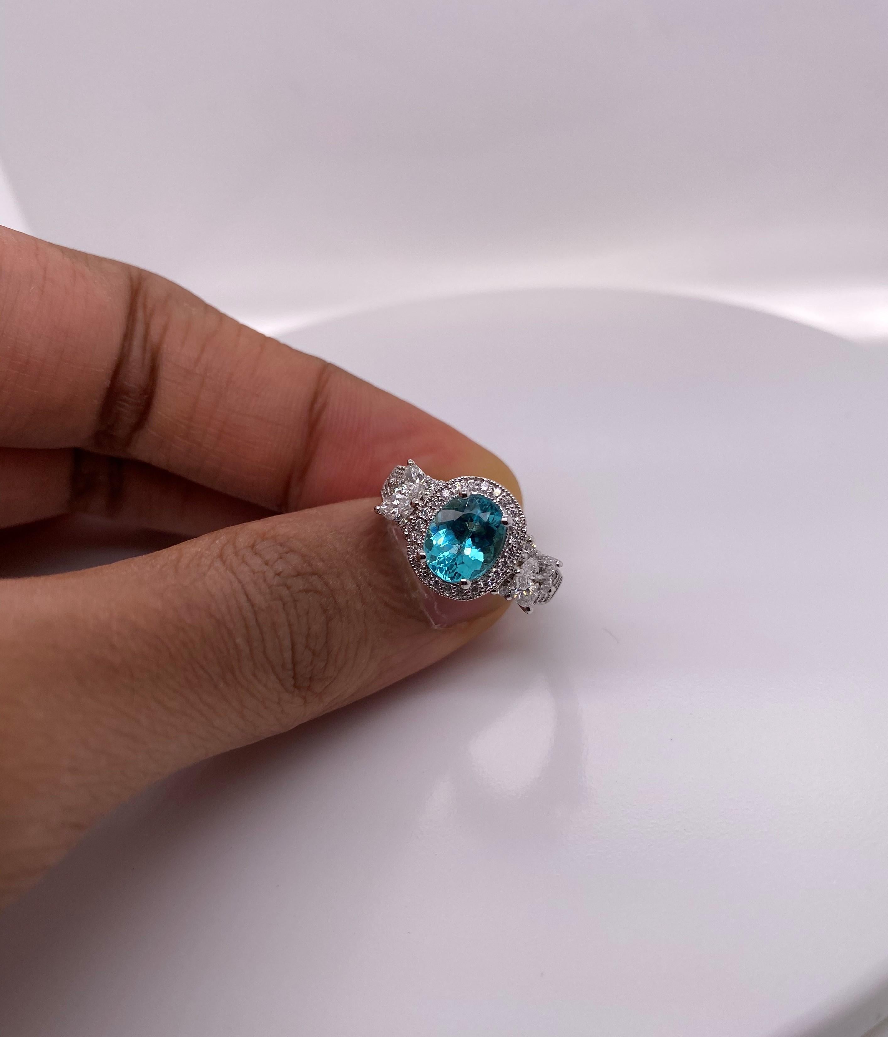 Oval Cut 1.7 Carat Paraiba and White Diamond Ring in 18 Karat White Gold For Sale