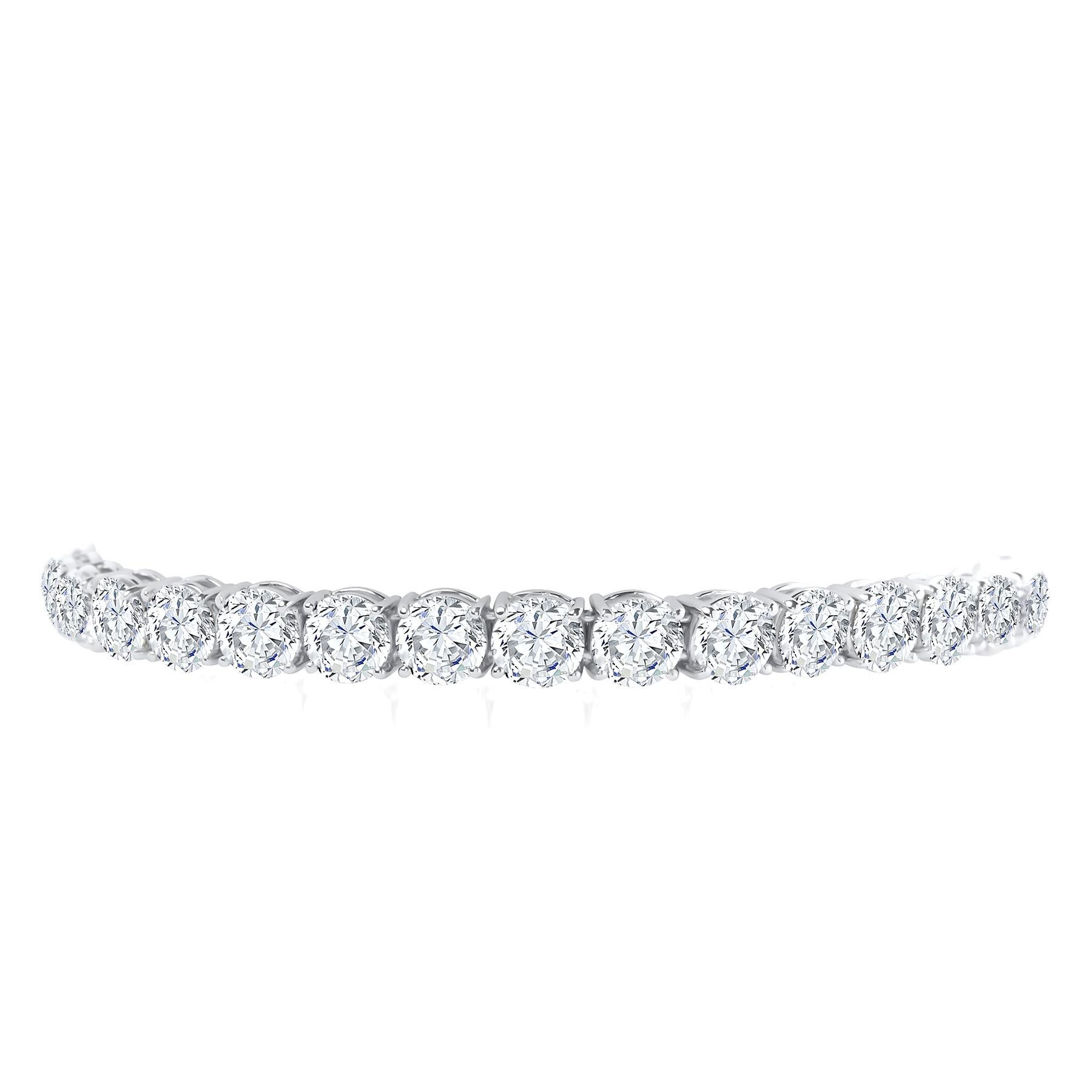  Sophisticated elegance. Platinum handcrafted bracelet.
Set with 35 Ideal Round Brilliant Cut Diamonds average weight of each stone is over one half a carat each! .50+.
The Diamonds are near colorless EFG color and having a clarity of SI. 
We