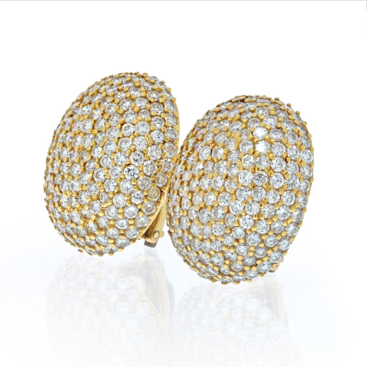 Indulge in the resplendent glamour of these 17 Carats Large Bombe Diamond Cluster Oval Clip Earrings, meticulously crafted in 18K Yellow Gold. 

These earrings are a jubilant celebration of elegance, making them the perfect accompaniment for special