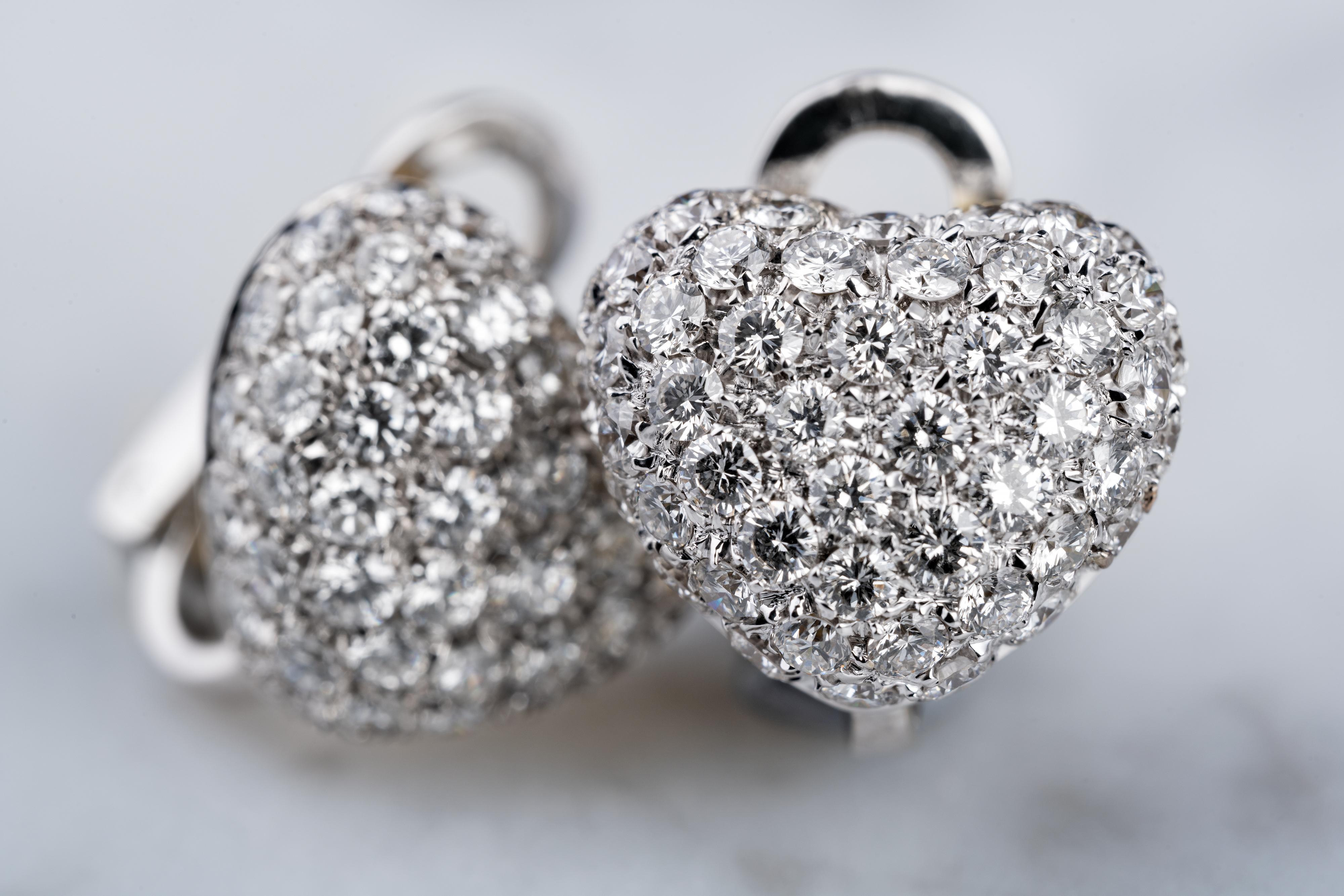 Pleased to introduce our Leo Pizzo Amore heart-shaped circular-cut diamond ear studs. Diamonds total weight is approximately 1.7 carats and set in 18K white gold. Calls for beauty and elegance. 