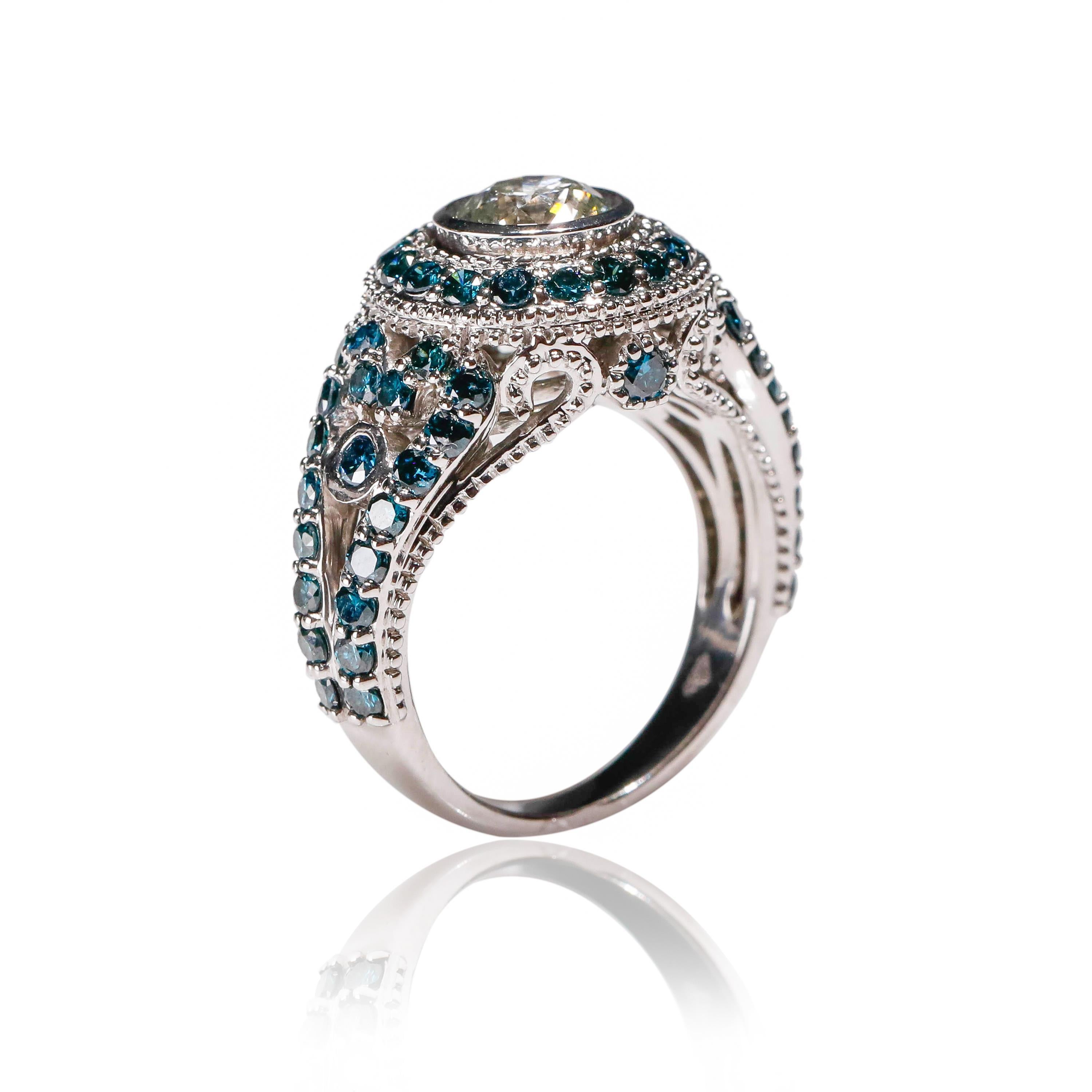 1.7 CT Blue Diamond 0.83 CT White Diamond Cocktail Ring 14KT White Gold 

Luxurious in every way, this ring is a stunning example of how you should feel wearing it. Features 0.83 tcw shimmering diamonds aligned together in 1.7 TCW of a deep blue