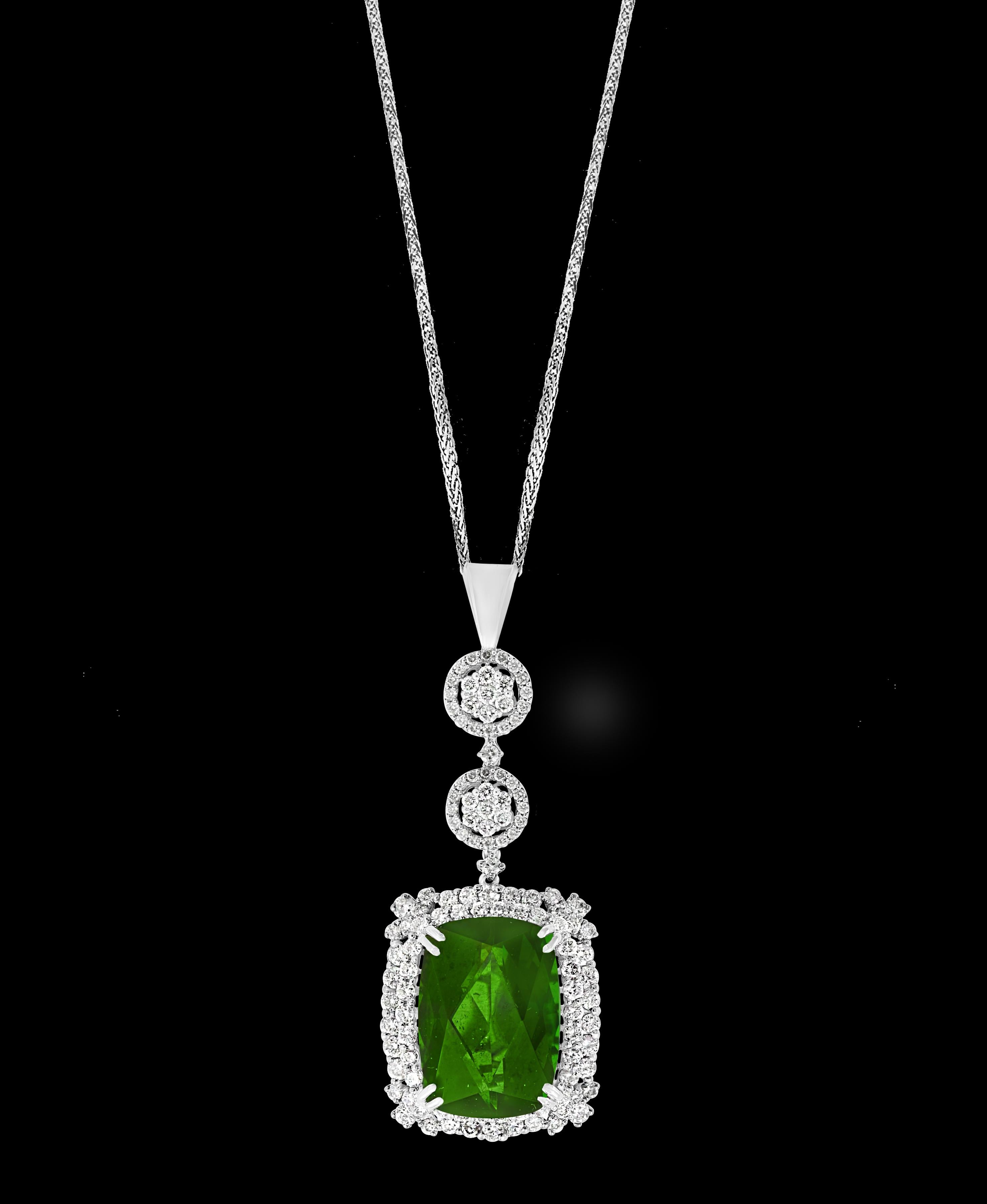   17.16 Carat Green Tourmaline  & Diamond Pendant /  Necklace 14 Karat  Gold, Estate
This spectacular Pendant Necklace  consisting of a single Cushion  Shape Green Tourmaline  17.16 Carat.  The  Green Tourmaline  is surrounded by approximately  4