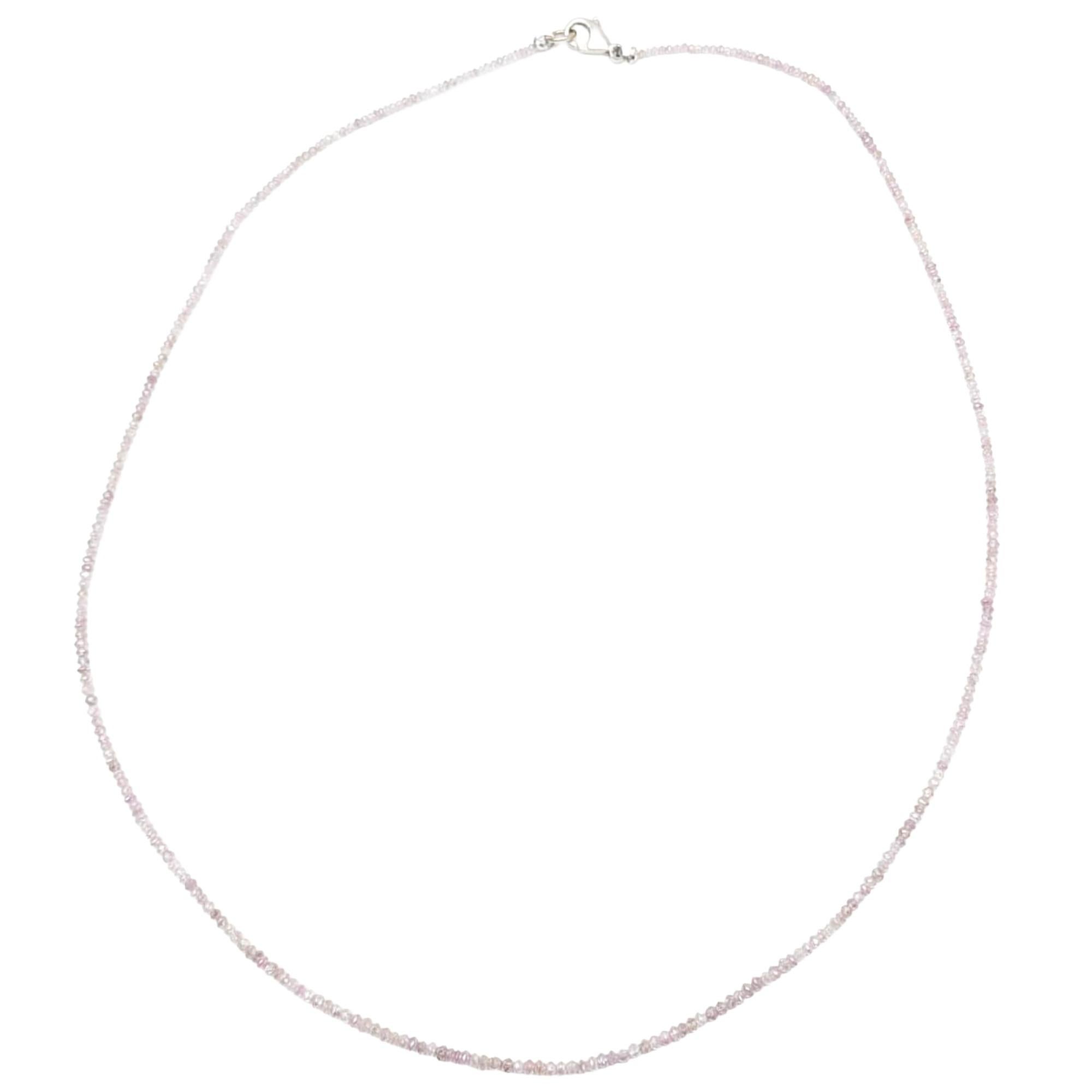 Soft, radiant, and undeniably luxurious, this 17-inch pink diamond faceted bead necklace is a celebration of rare color and refined elegance. Each natural pink diamond bead is expertly faceted to enhance its brilliance, creating a delicate shimmer