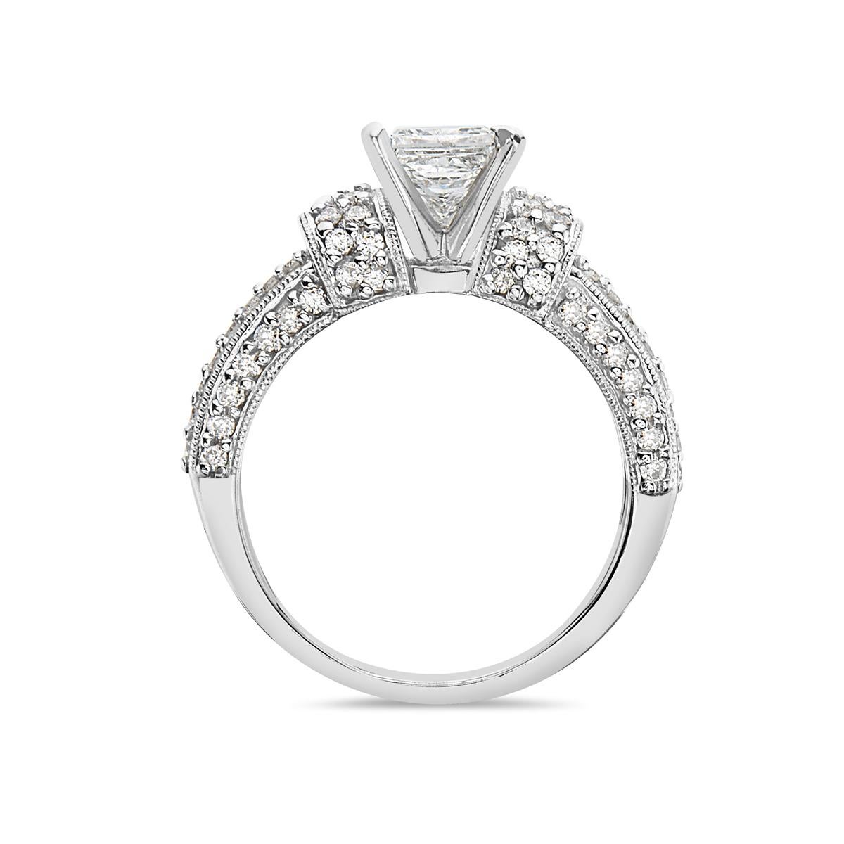 This engagement ring features 1.10 carats of G-H VS diamonds and 0.6 carats G-H VS side stones. Size 7. Made in Italy. 

Resizeable upon request.

Viewings available in our NYC showroom by appointment.