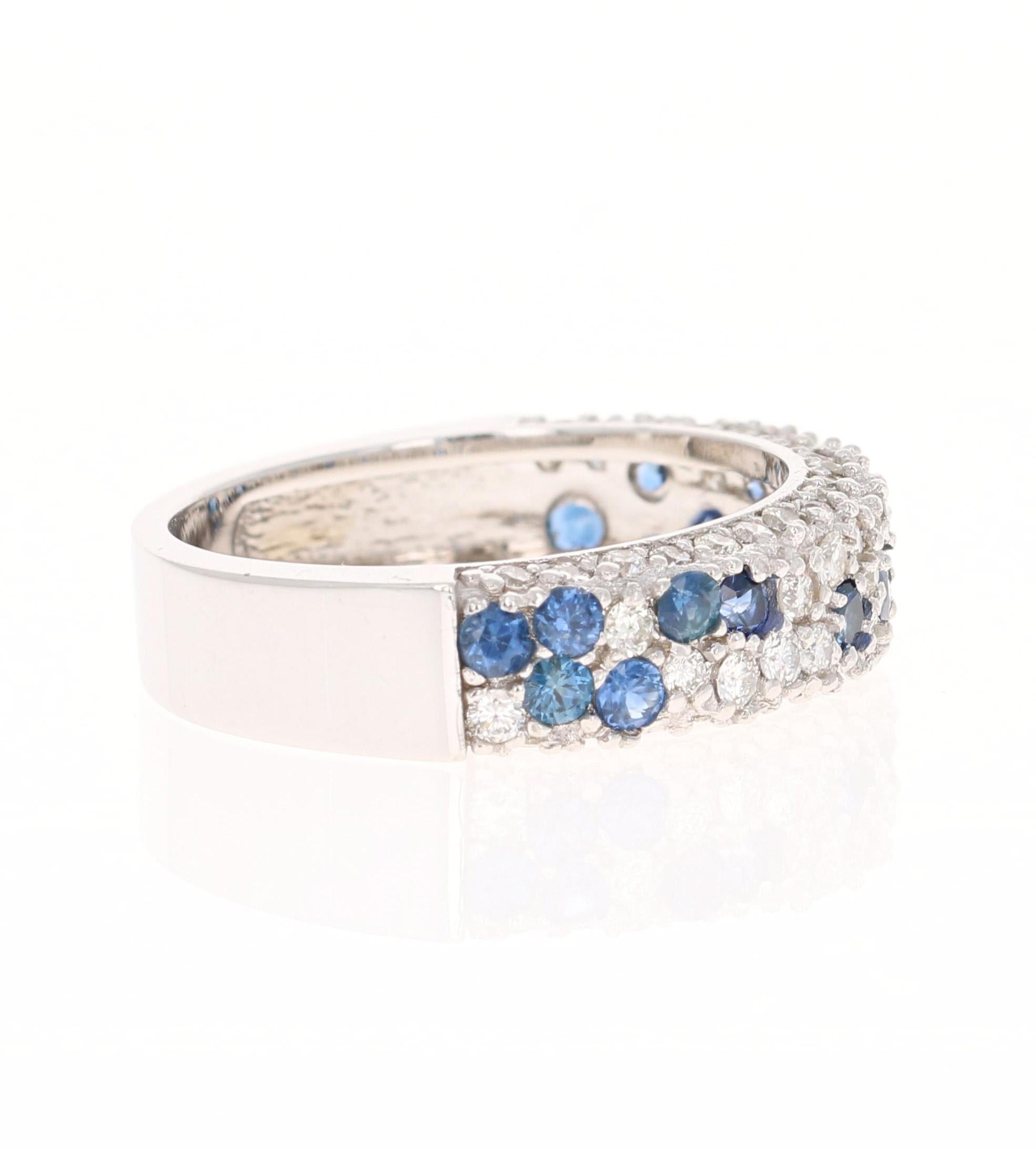 This band has 16 Blue Sapphires that weigh 0.93 carats and 61 Round Cut Diamonds that weigh 0.77 carats. (Clarity: VS Color: H) The total carat weight of the ring is 1.70 carats. 

The ring is designed in 18 Karat White Gold and weighs approximately