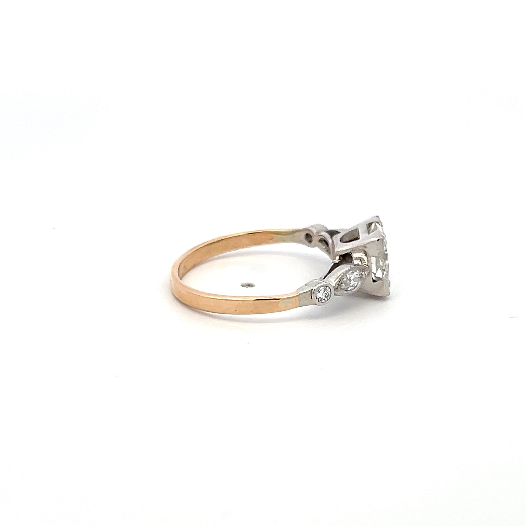 Title:
1.70 Carat Circular Brilliant Cut J VVS2 and Marquis Shape I VS2 and Old European Cut I VS1 Diamond 14 Karat Two Tone Gold/Platinum Vintage Ring
Style:
Vintage
Metal:
14 Karat Two Tone Gold/Plat
Gemstone 1:
1.55 Carat Diamond
Number of