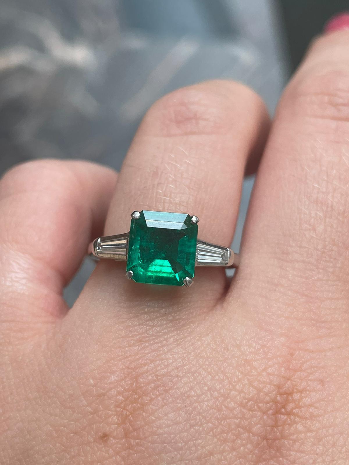 Emerald Cut 1.70 Carat Emerald and Diamond Three Stone Platinum Engagement Ring